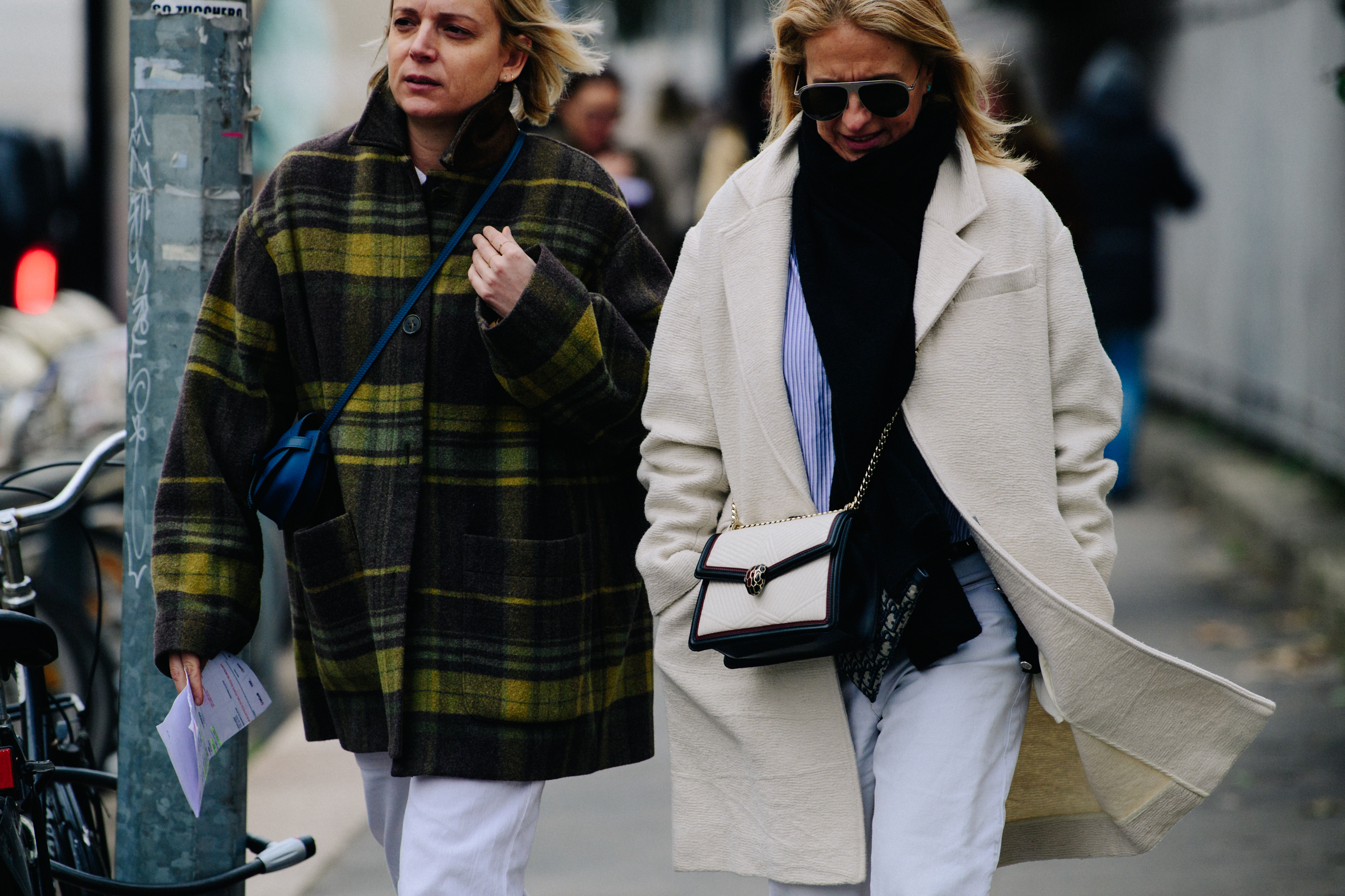 Two women wearing wool jackets