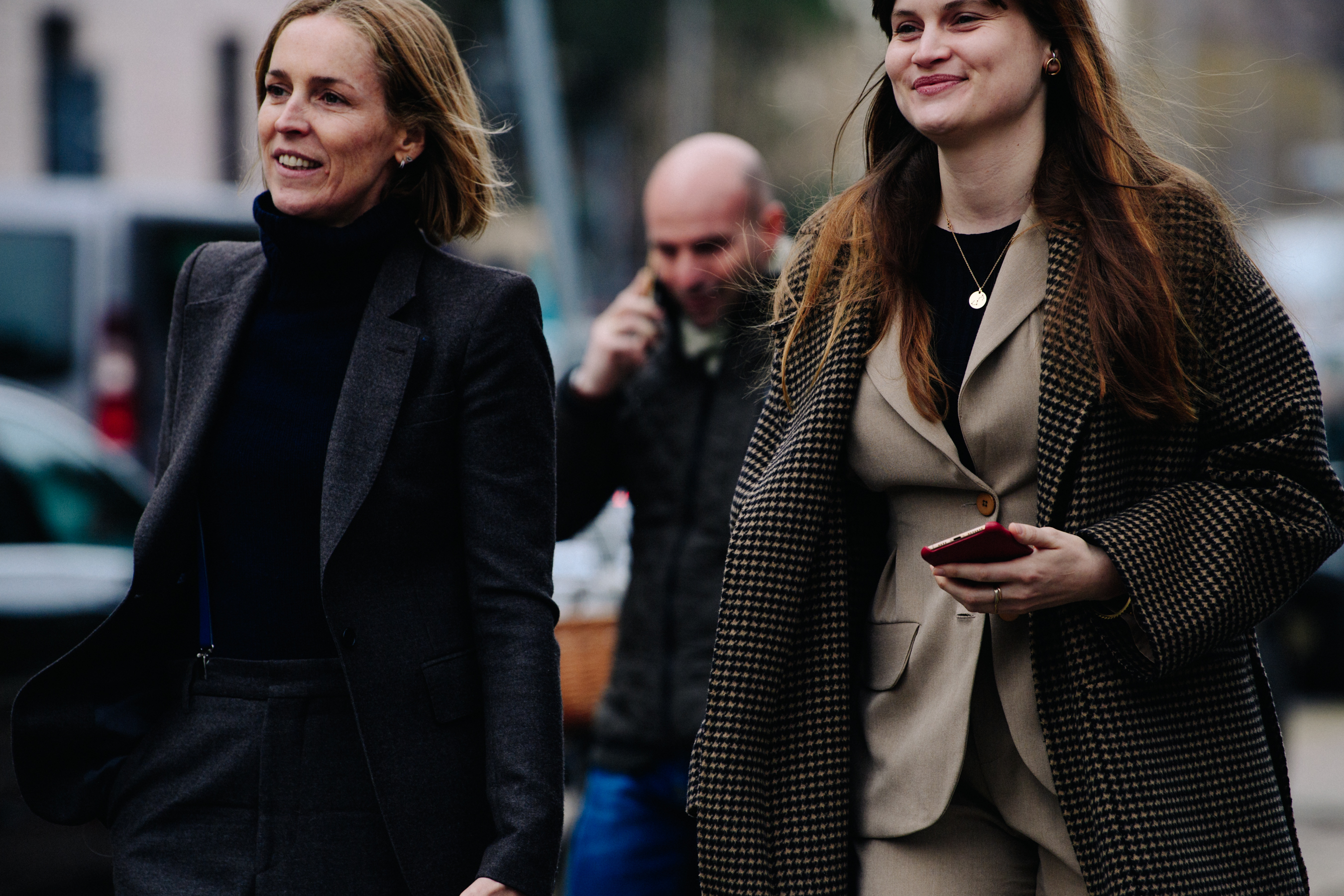 Two women wearing wool jackets