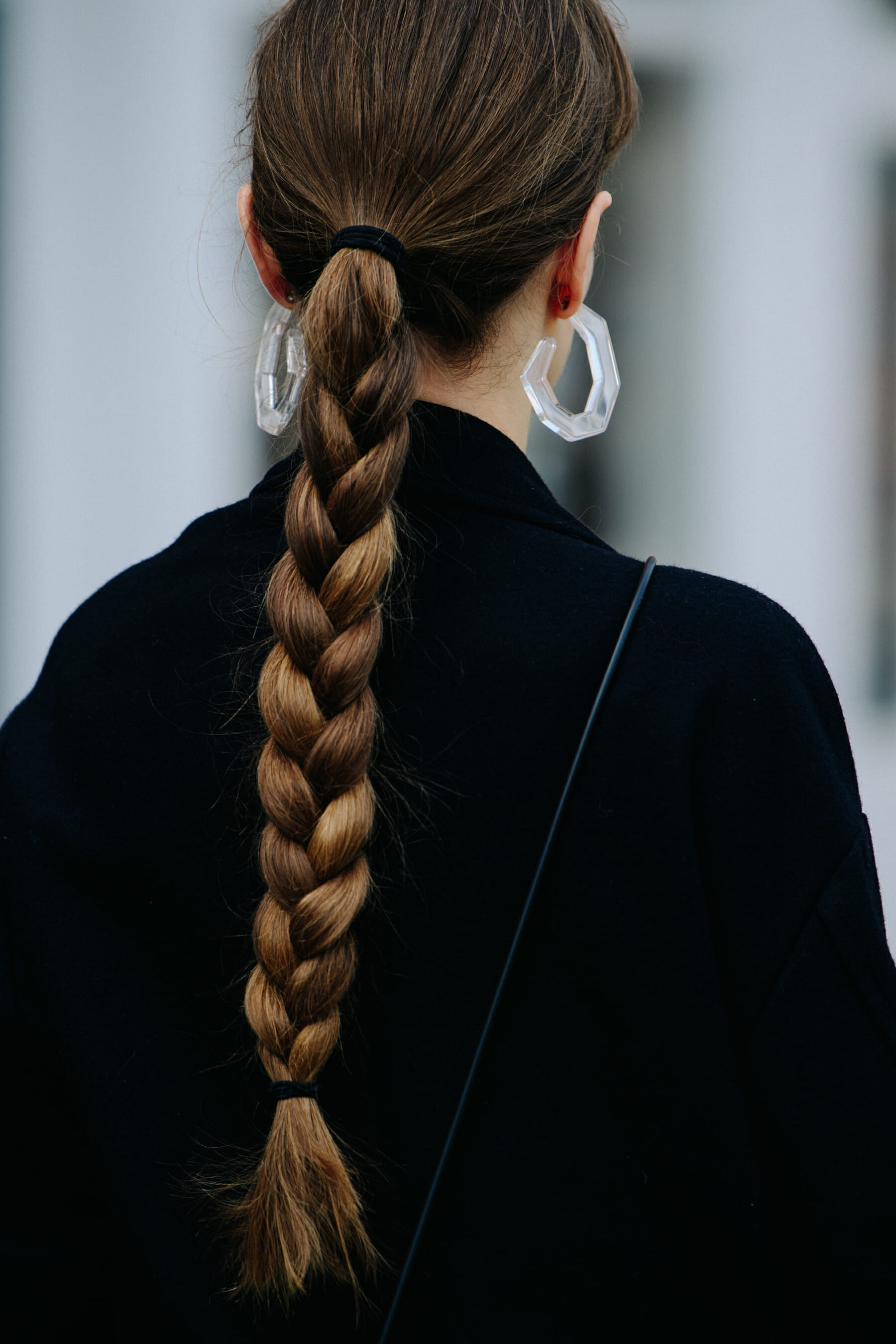 Woman with long plaited hair