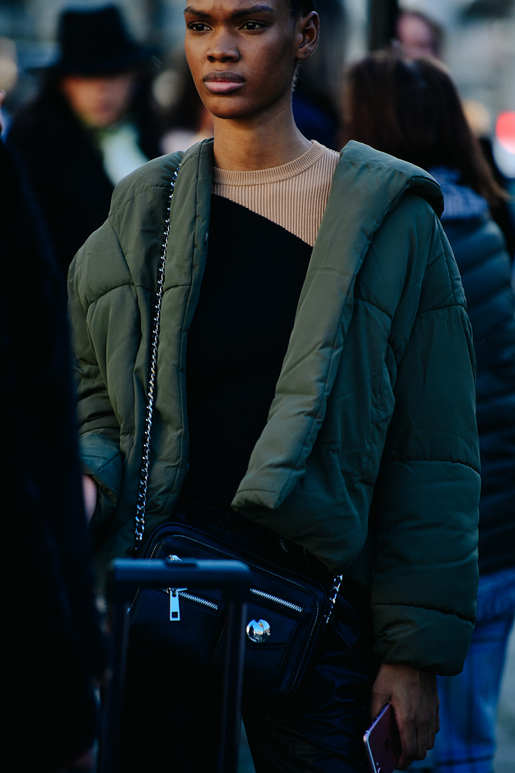 Model wearing green coat