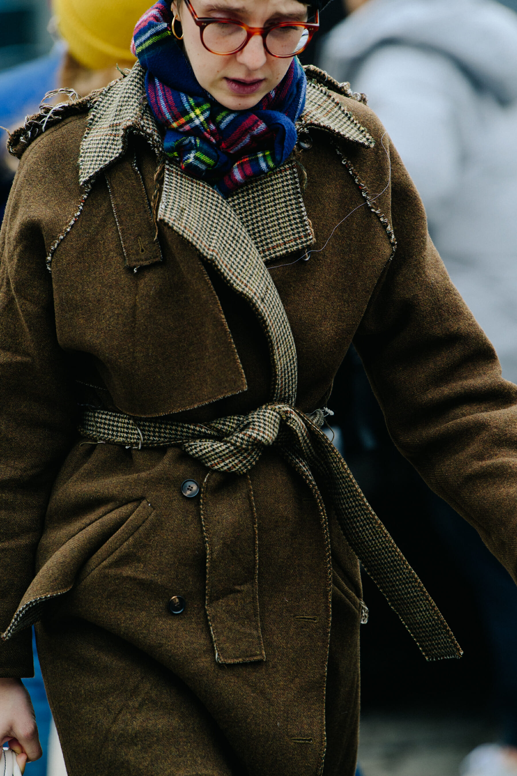 Woman wearing brown coat
