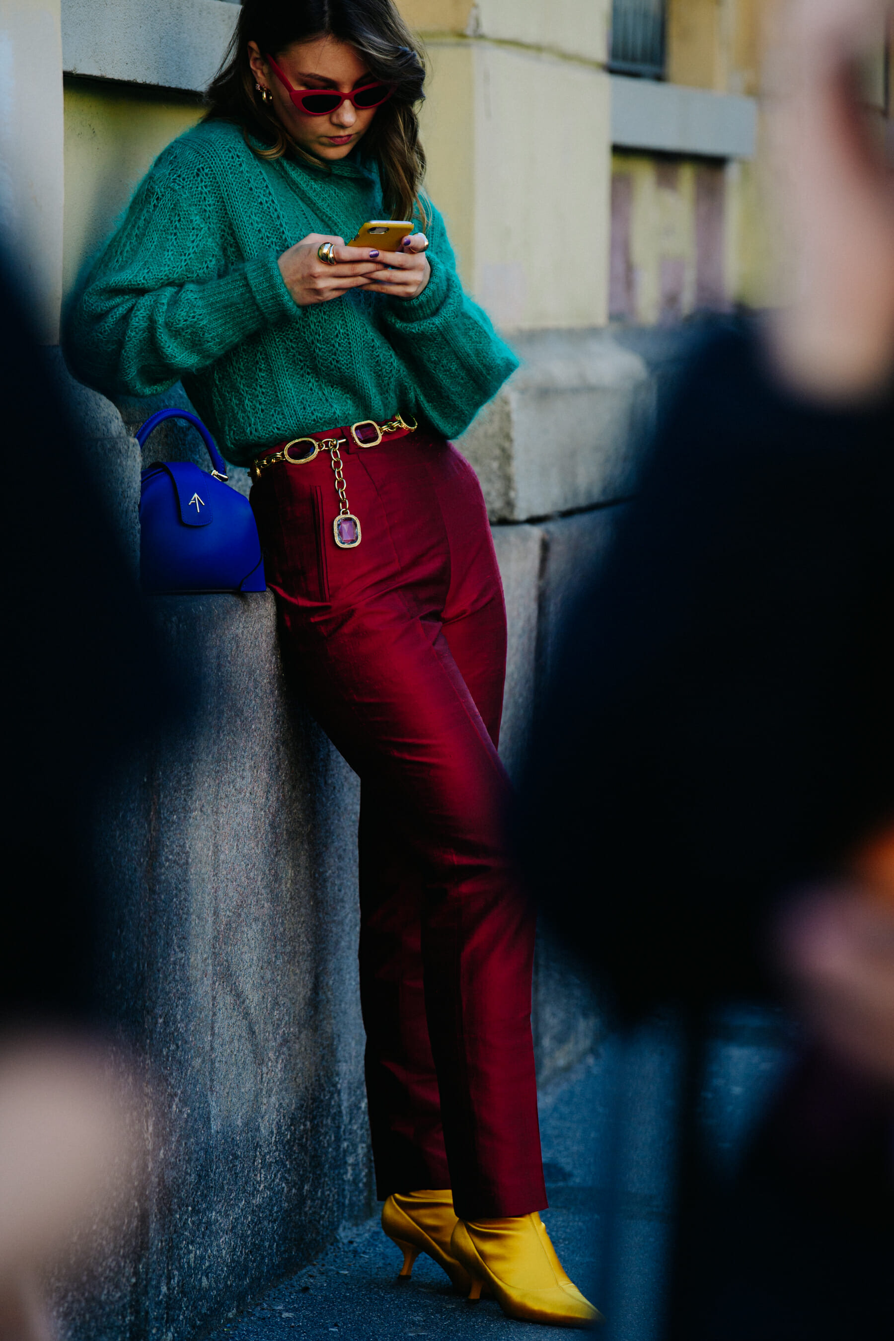 Woman wearing green and red outfit