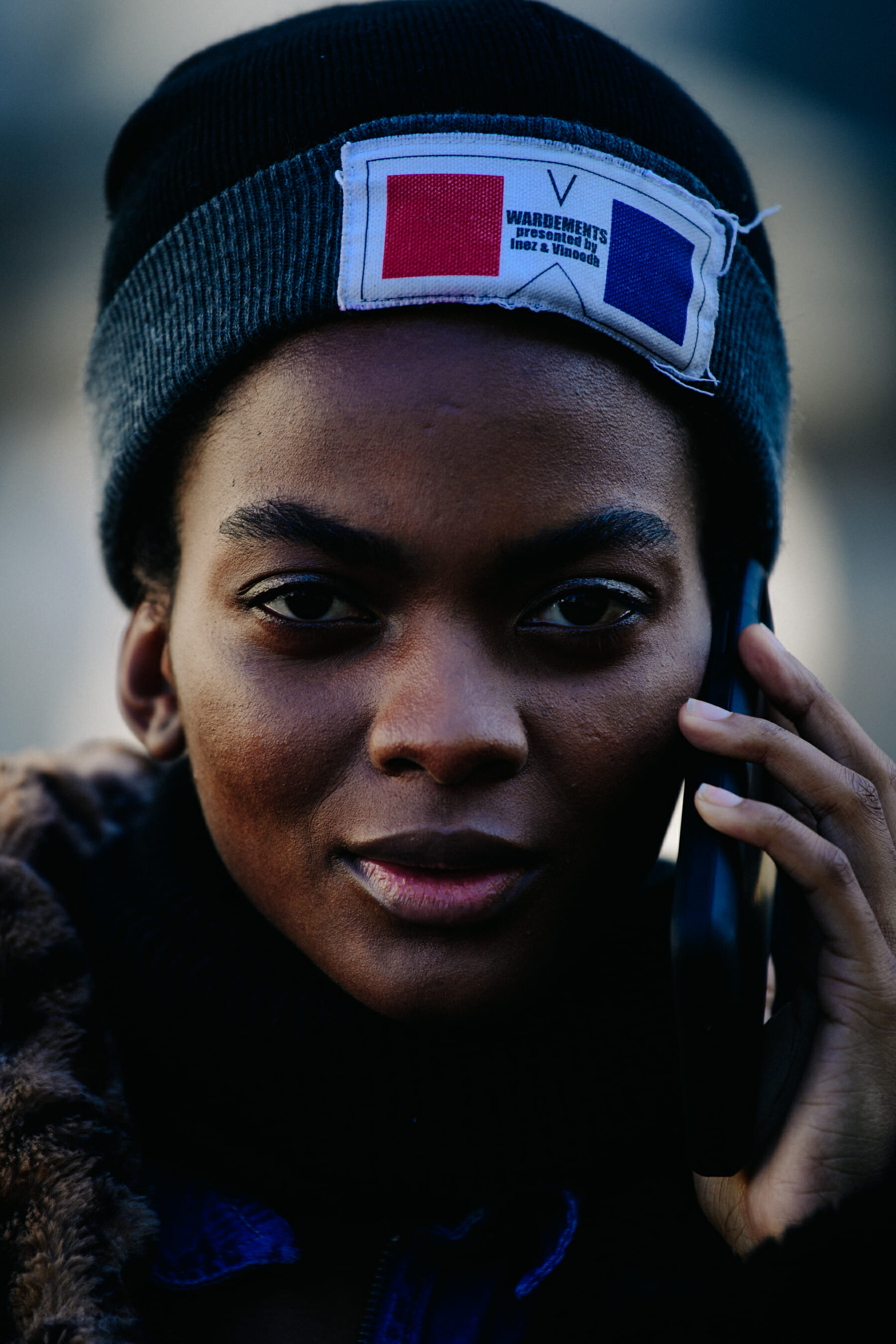 Portrait of model wearing dark beanie