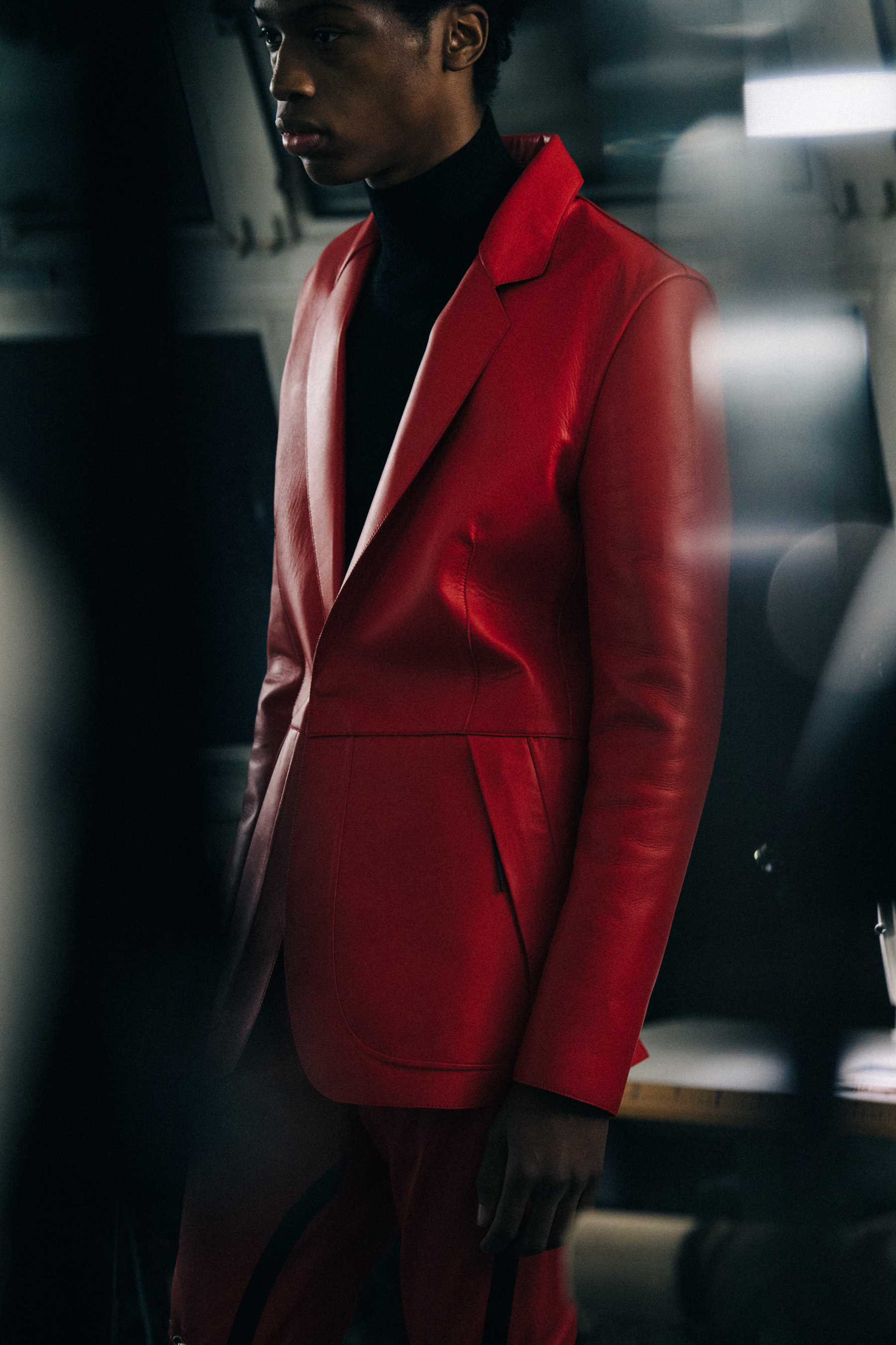 Model wearing red at 1017 ALYX 9SM