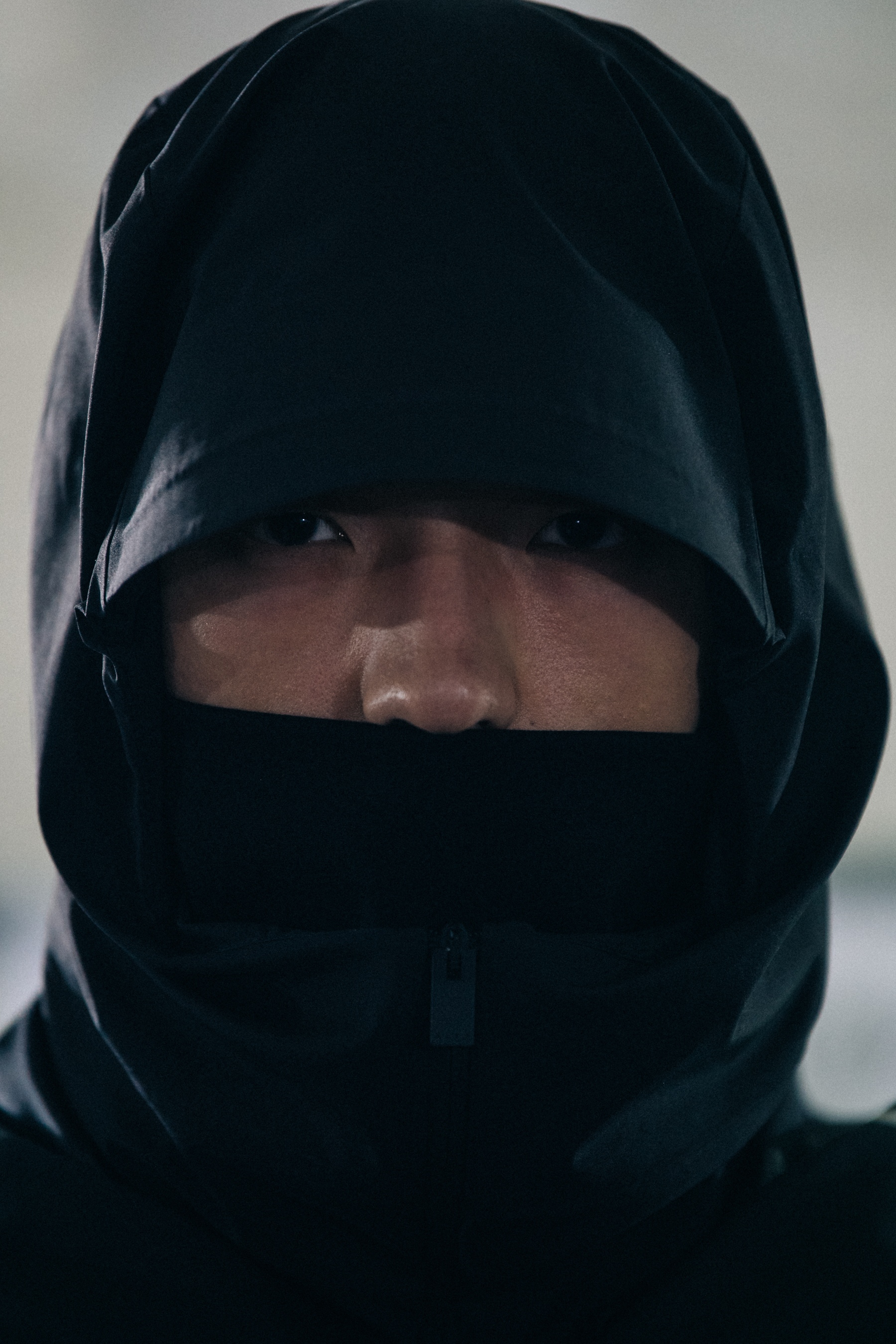 Portrait of model wearing hood