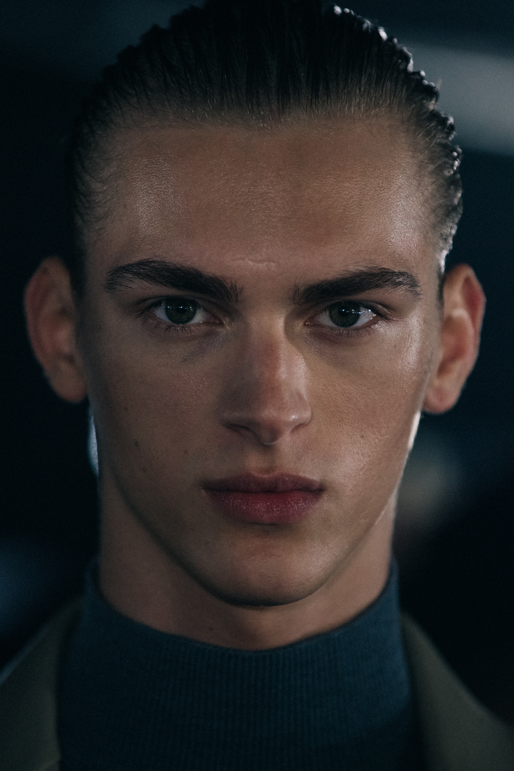 Portrait of model with slick hair
