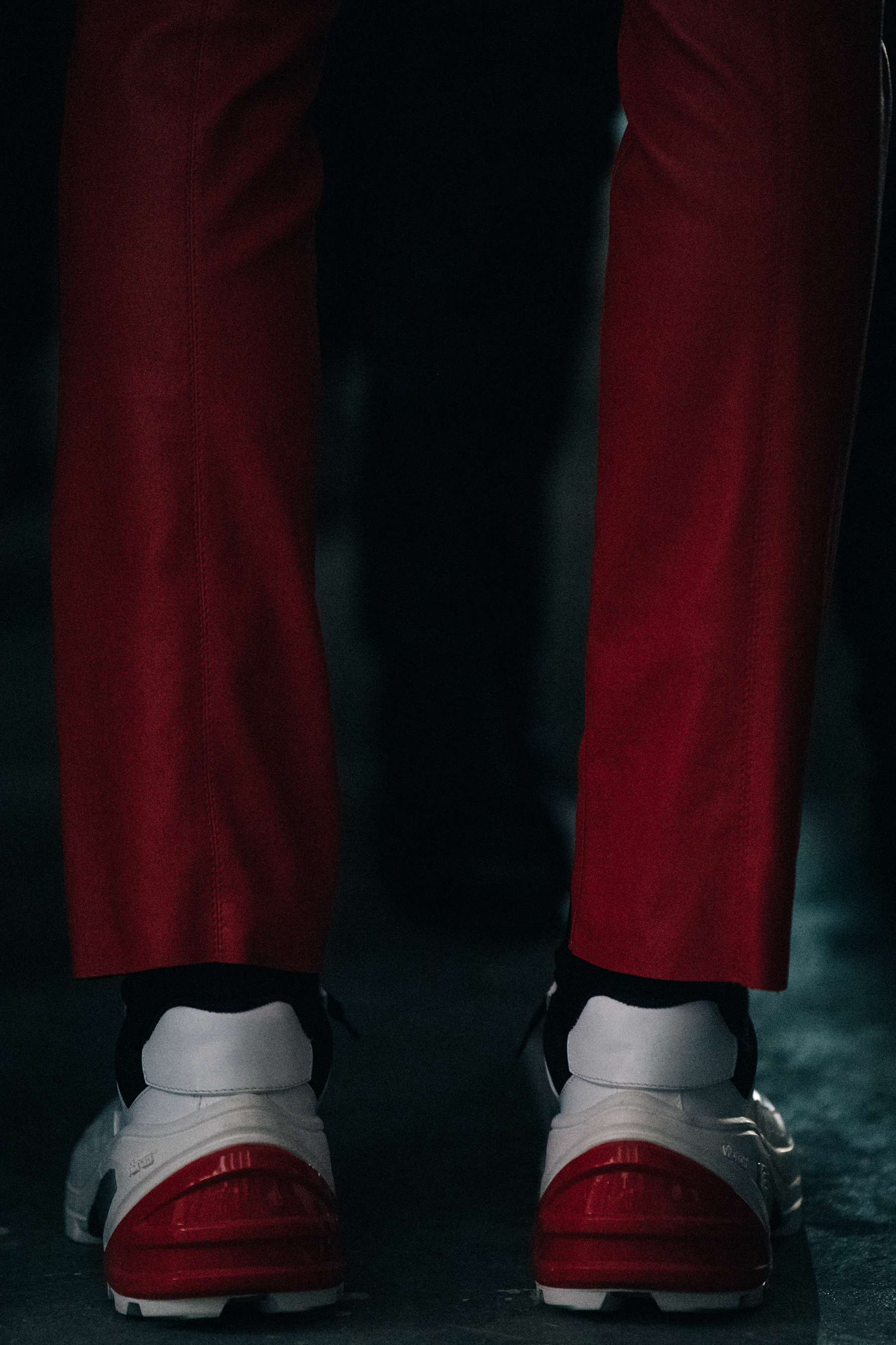Model wearing red at 1017 ALYX 9SM