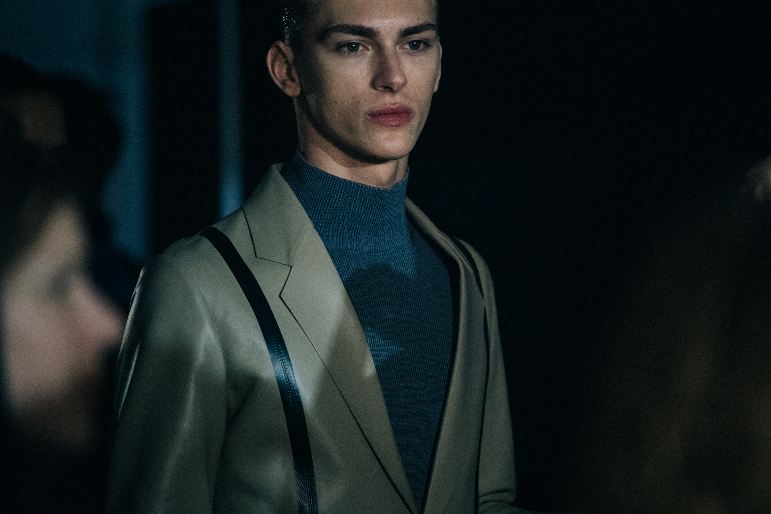 Model wearing light suit at 1017 ALYX 9SM