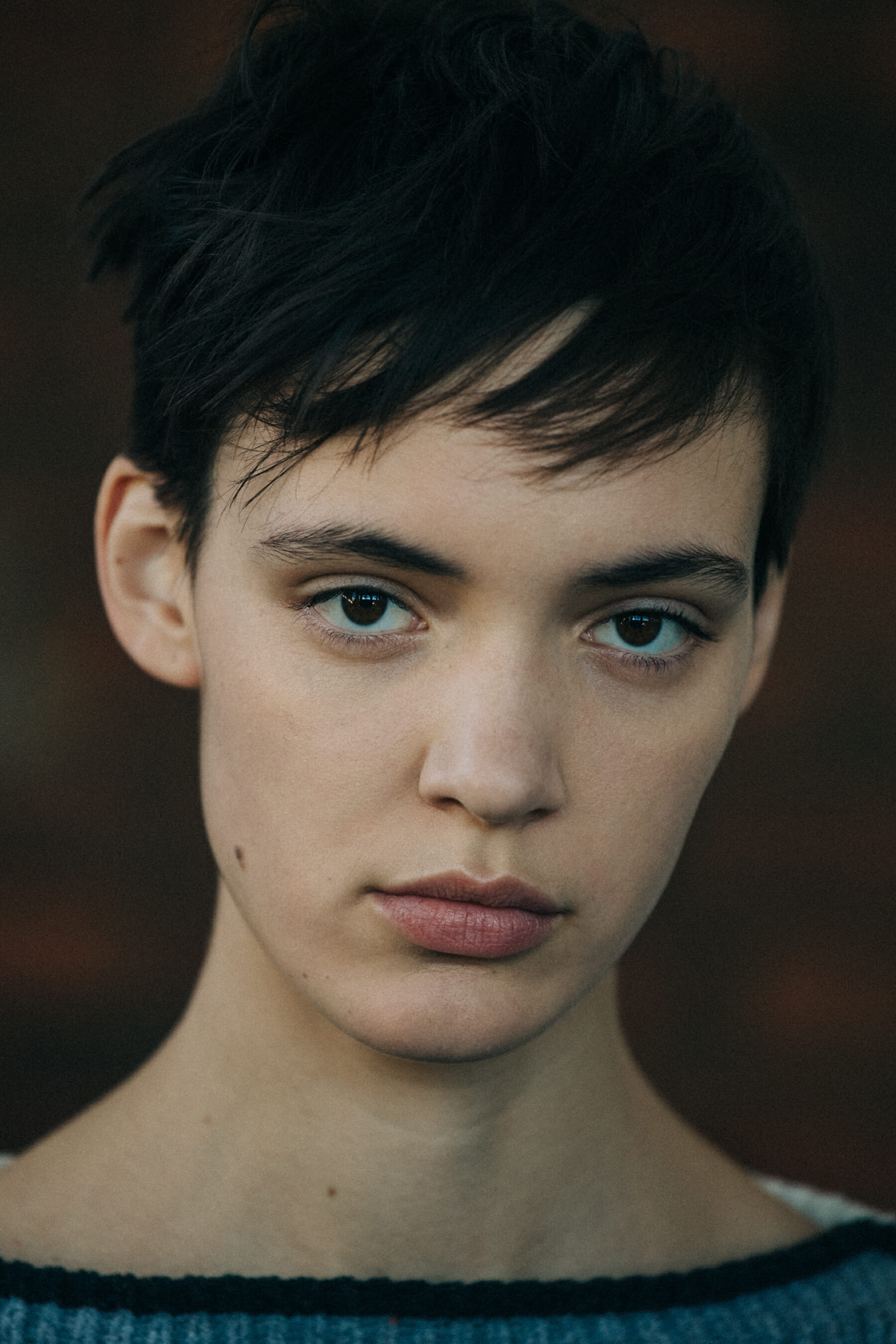 Portrait of model with short brown hair