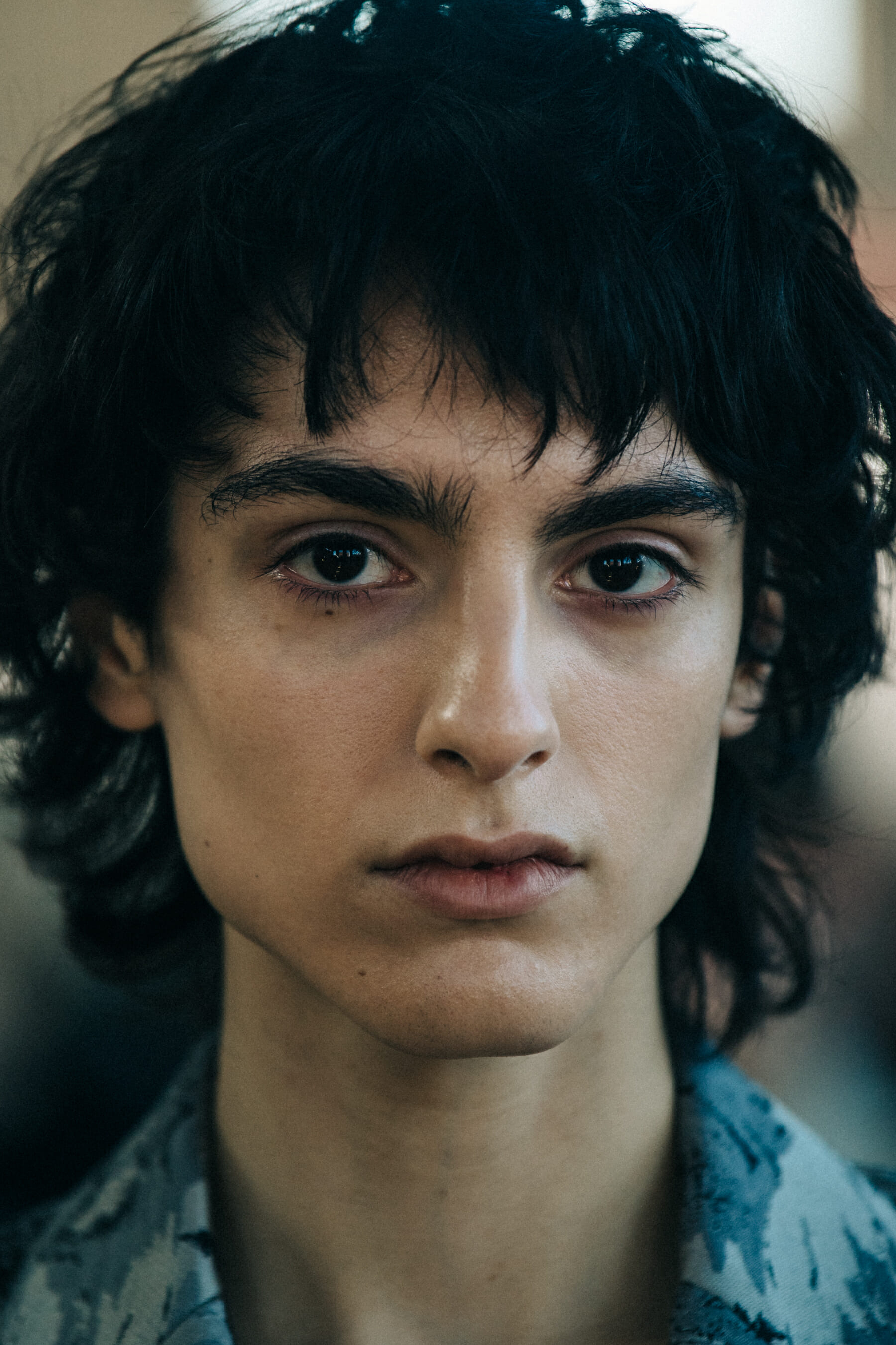 Portrait of model with long dark hair
