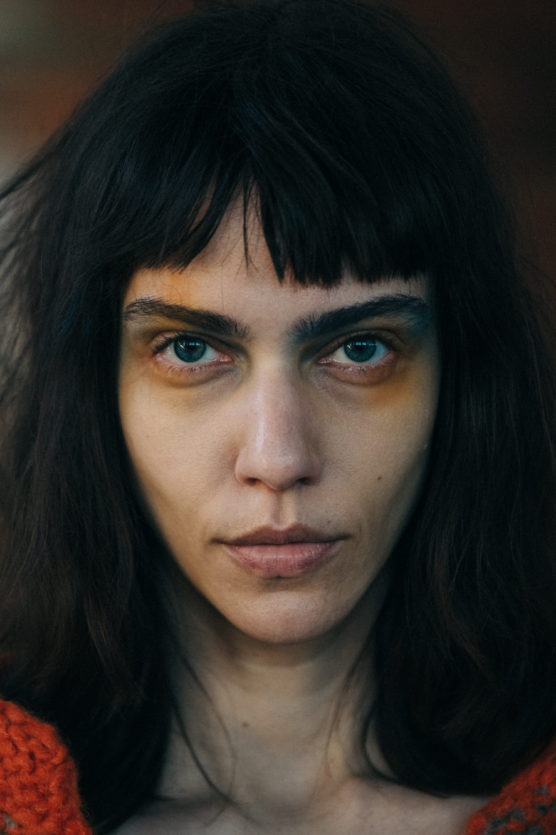 Portrait of model wearing colourful makeup