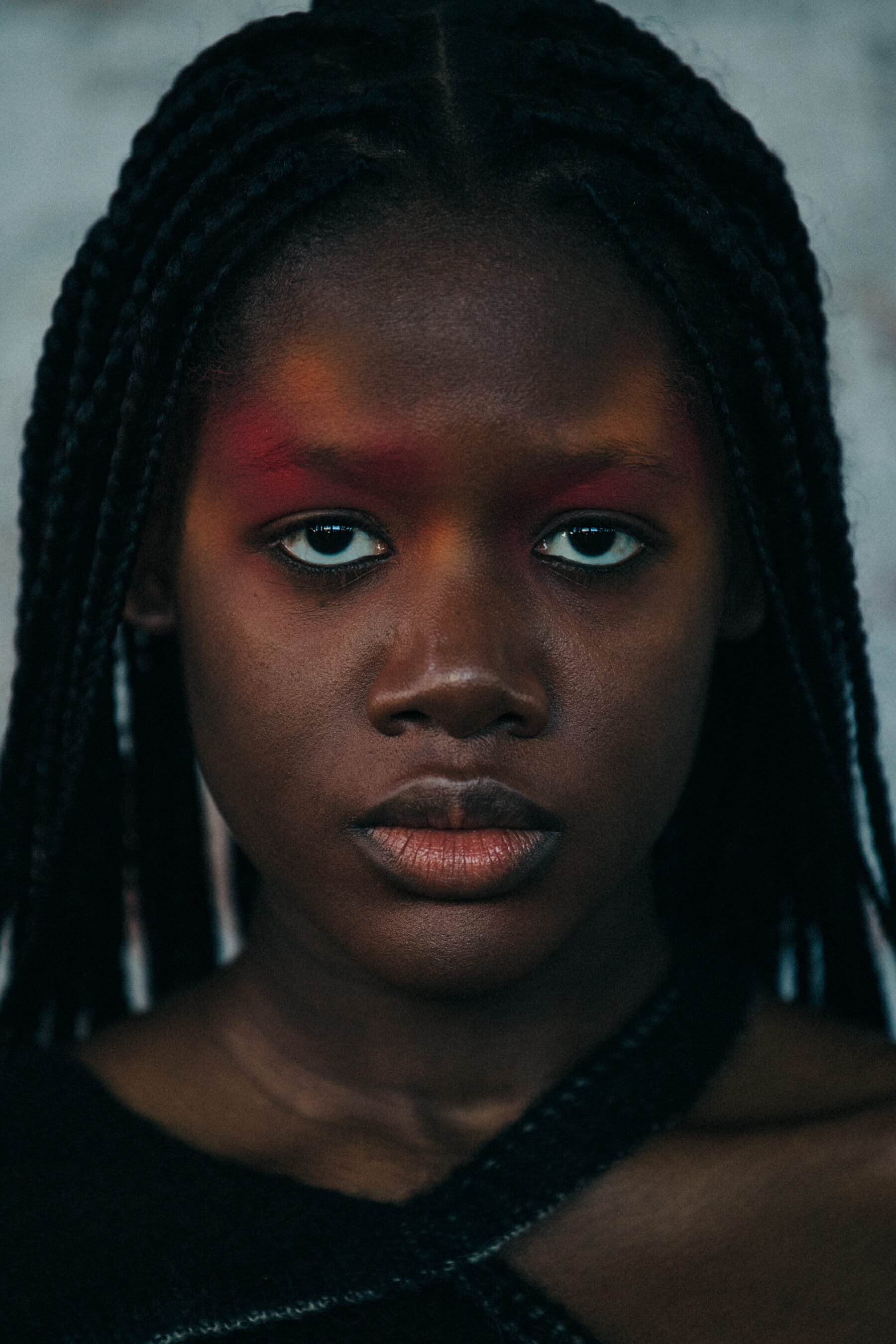 Portrait of model wearing colourful makeup