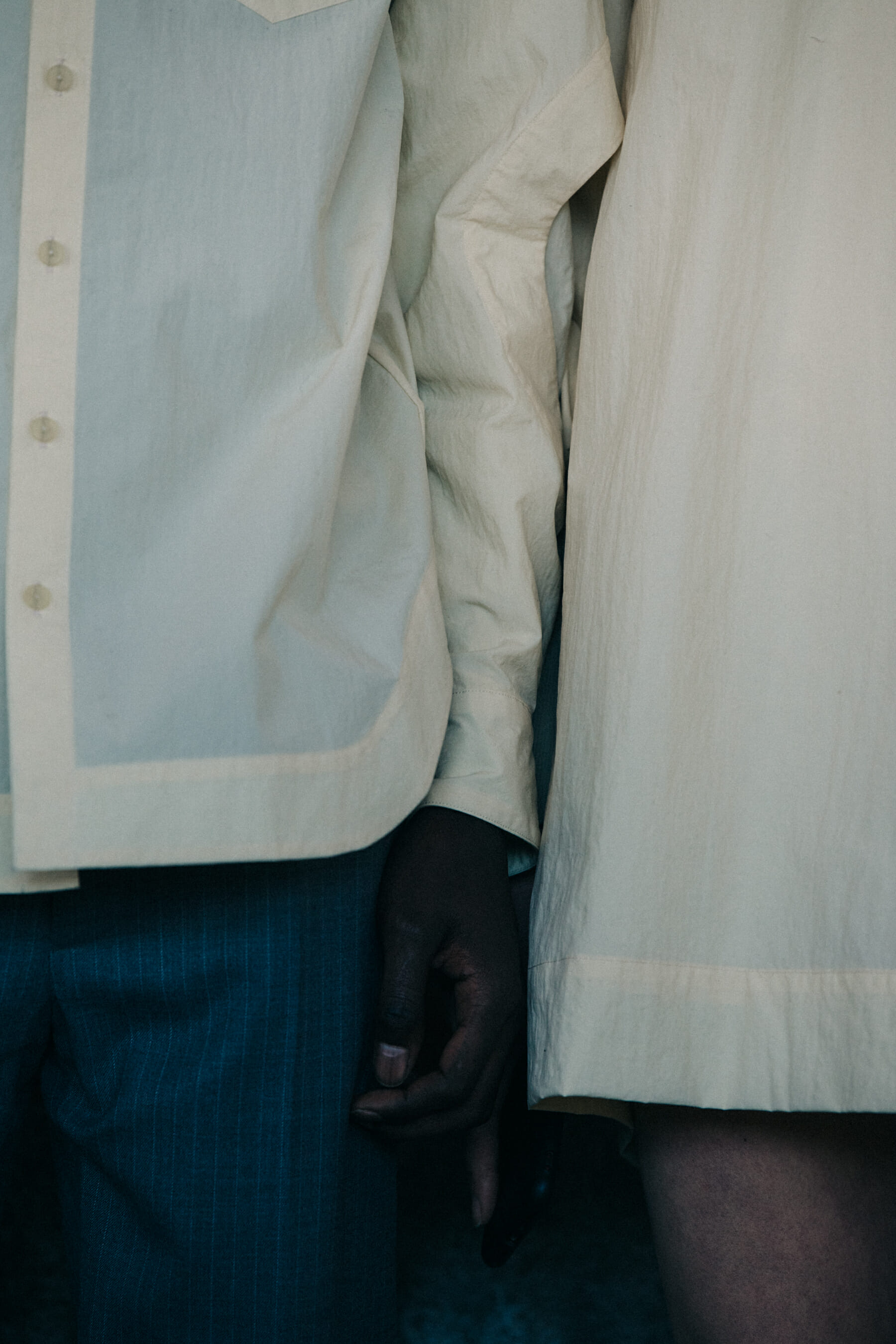 Models wearing cream at Eckhaus Latta