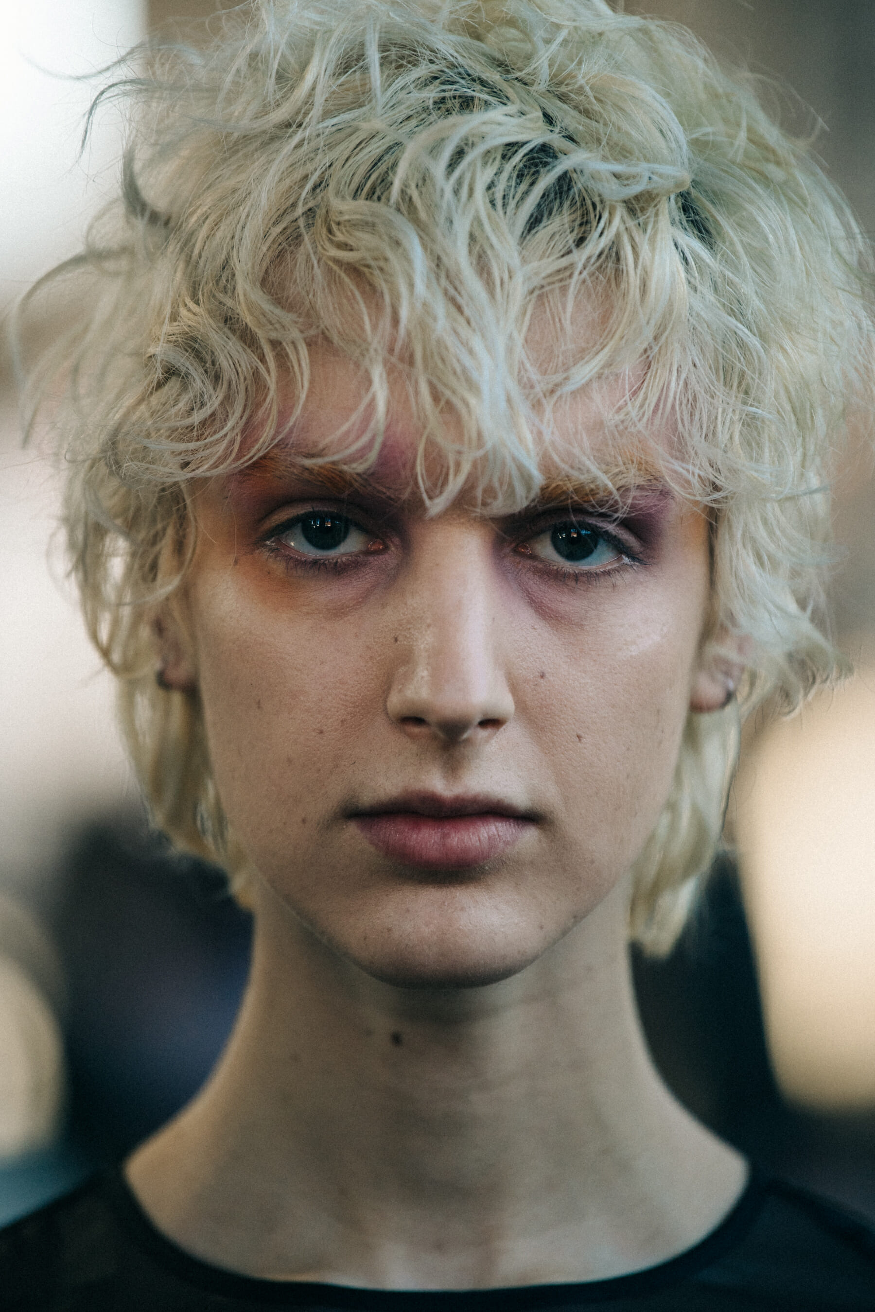 Portrait of model wearing colourful makeup