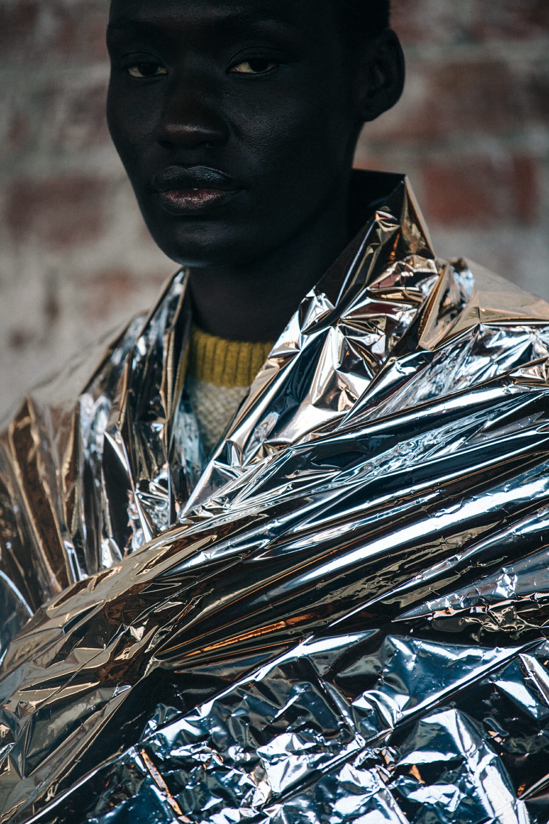 Models wearing space blankets