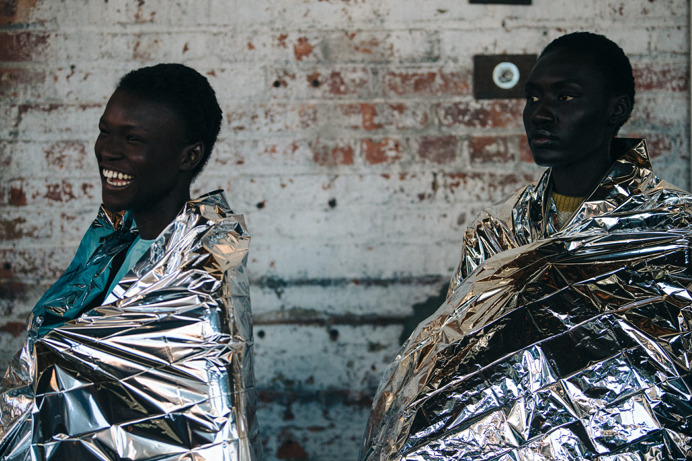 Models wearing space blankets