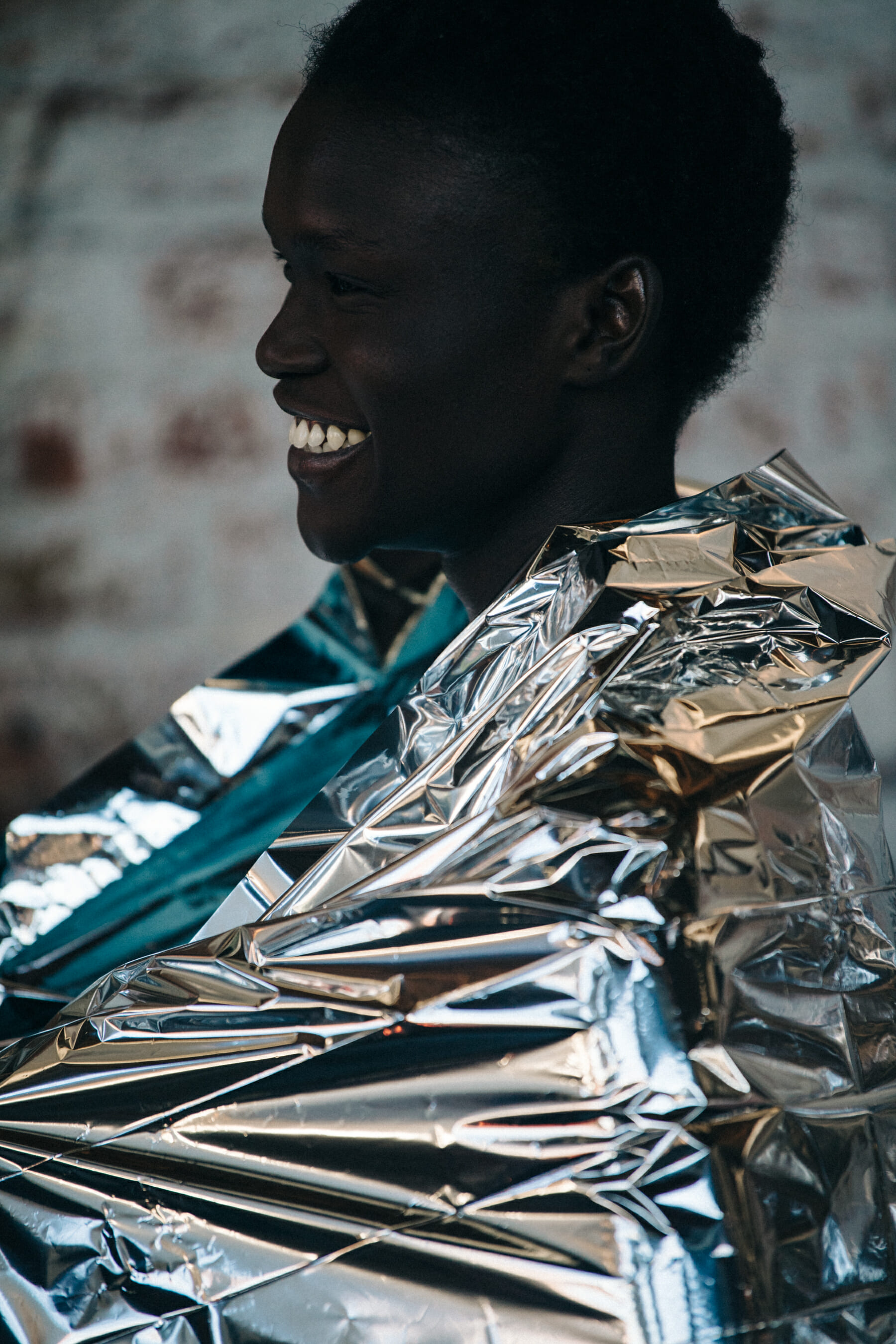 Models wearing space blankets