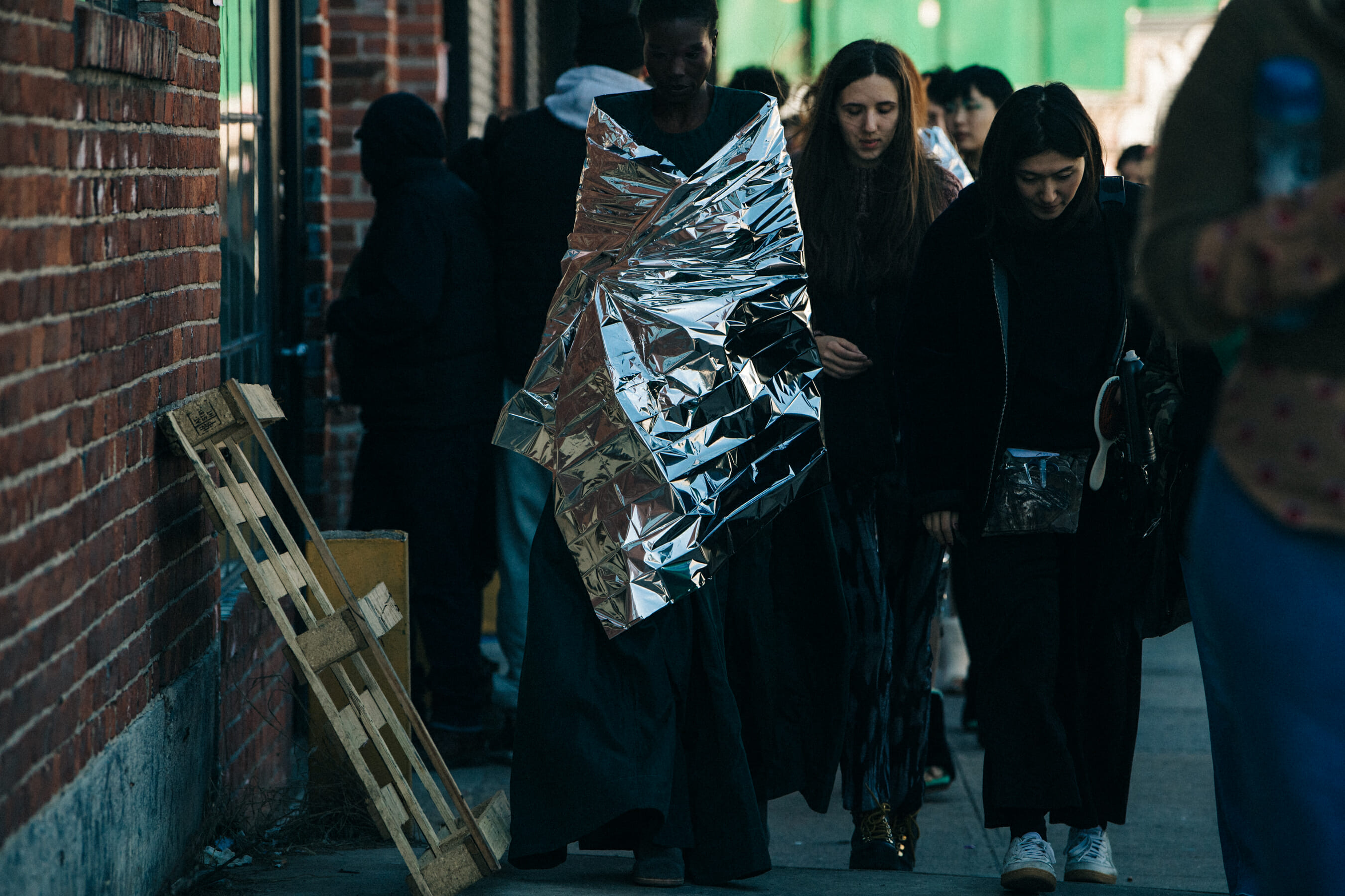 Models wearing space blankets