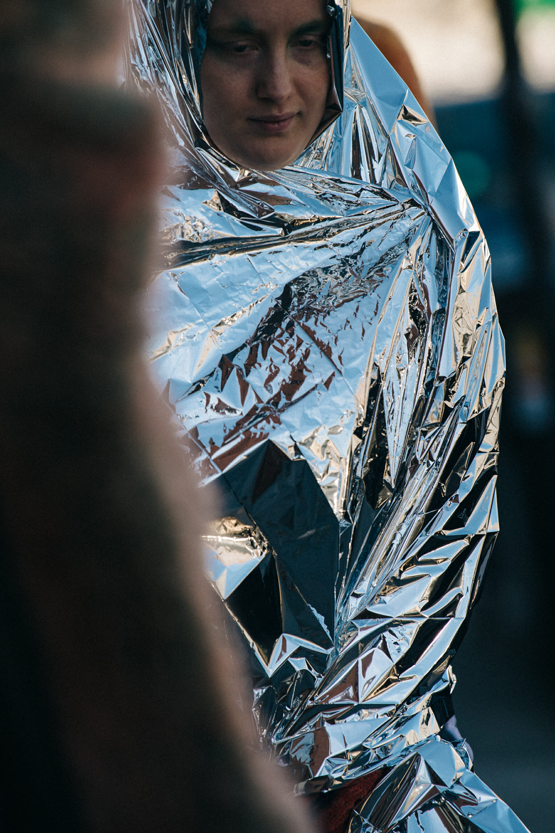 Models wearing space blankets