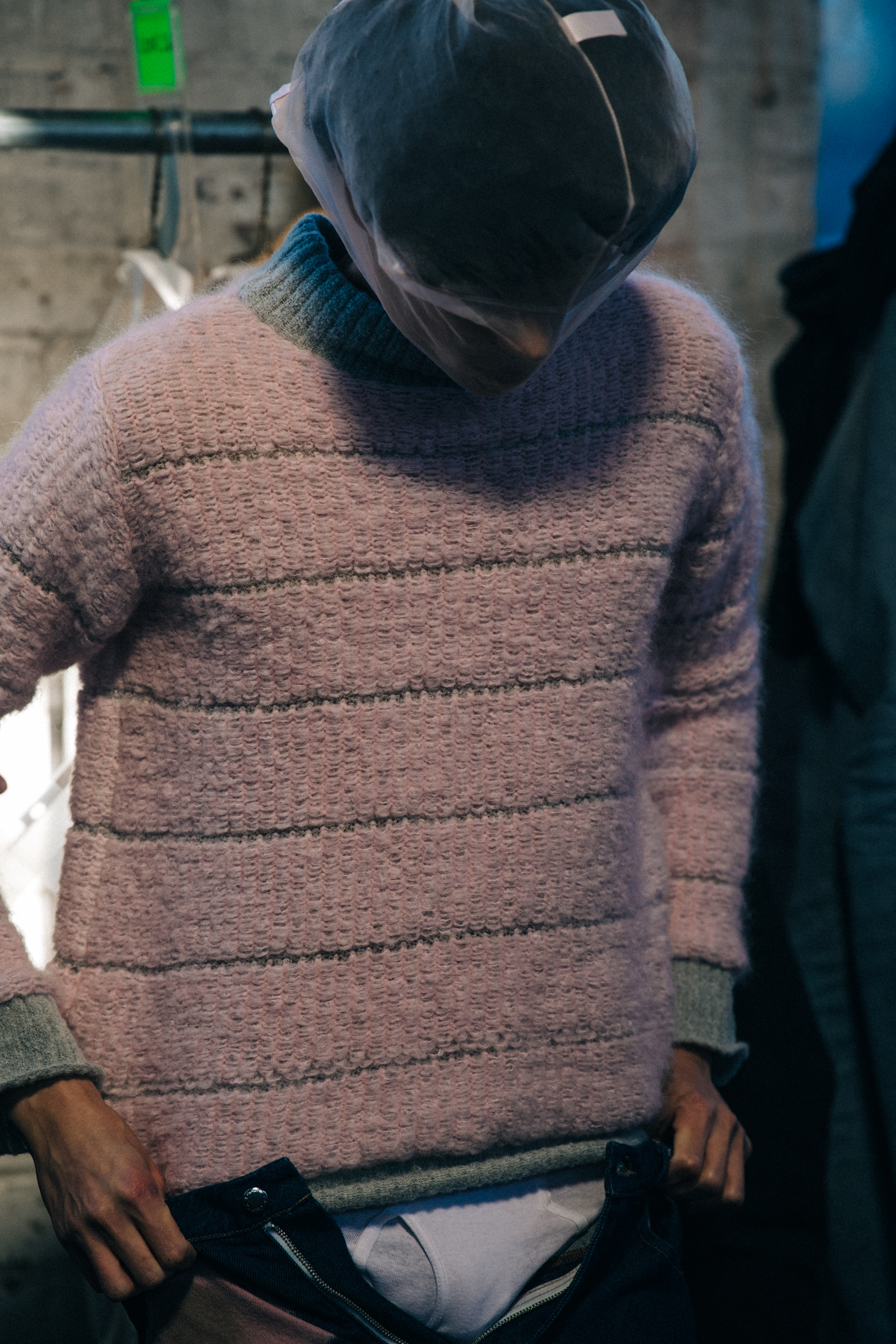 Model wearing pink backstage