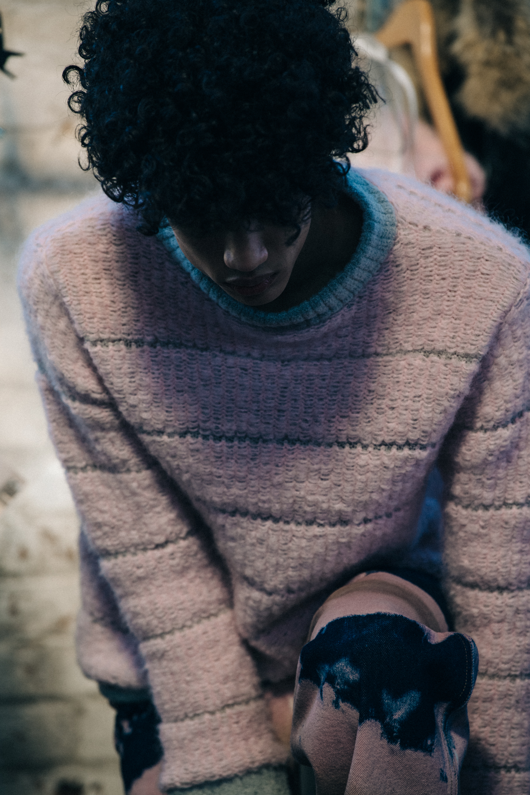Model wearing pink backstage