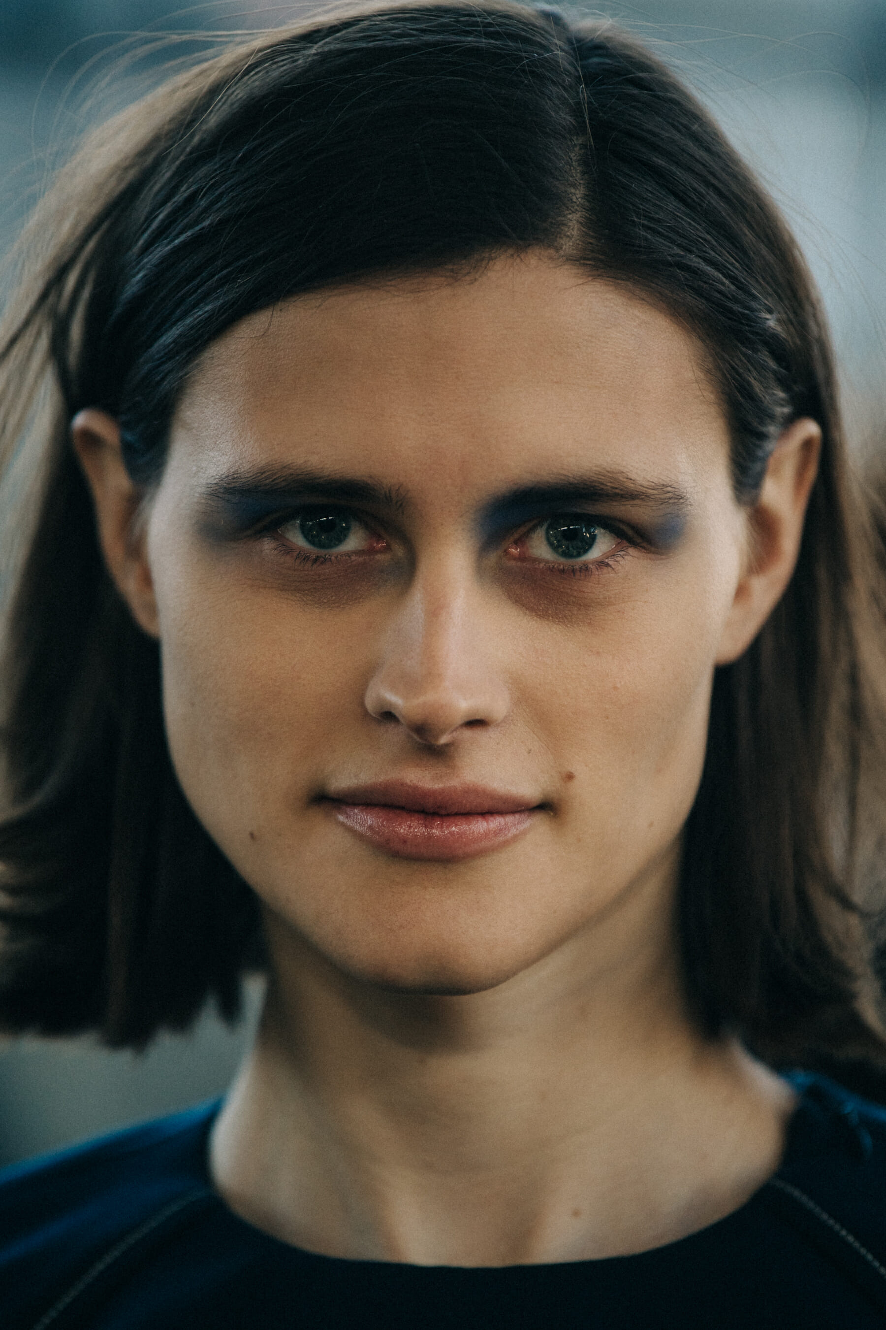 Portrait of model wearing colourful makeup