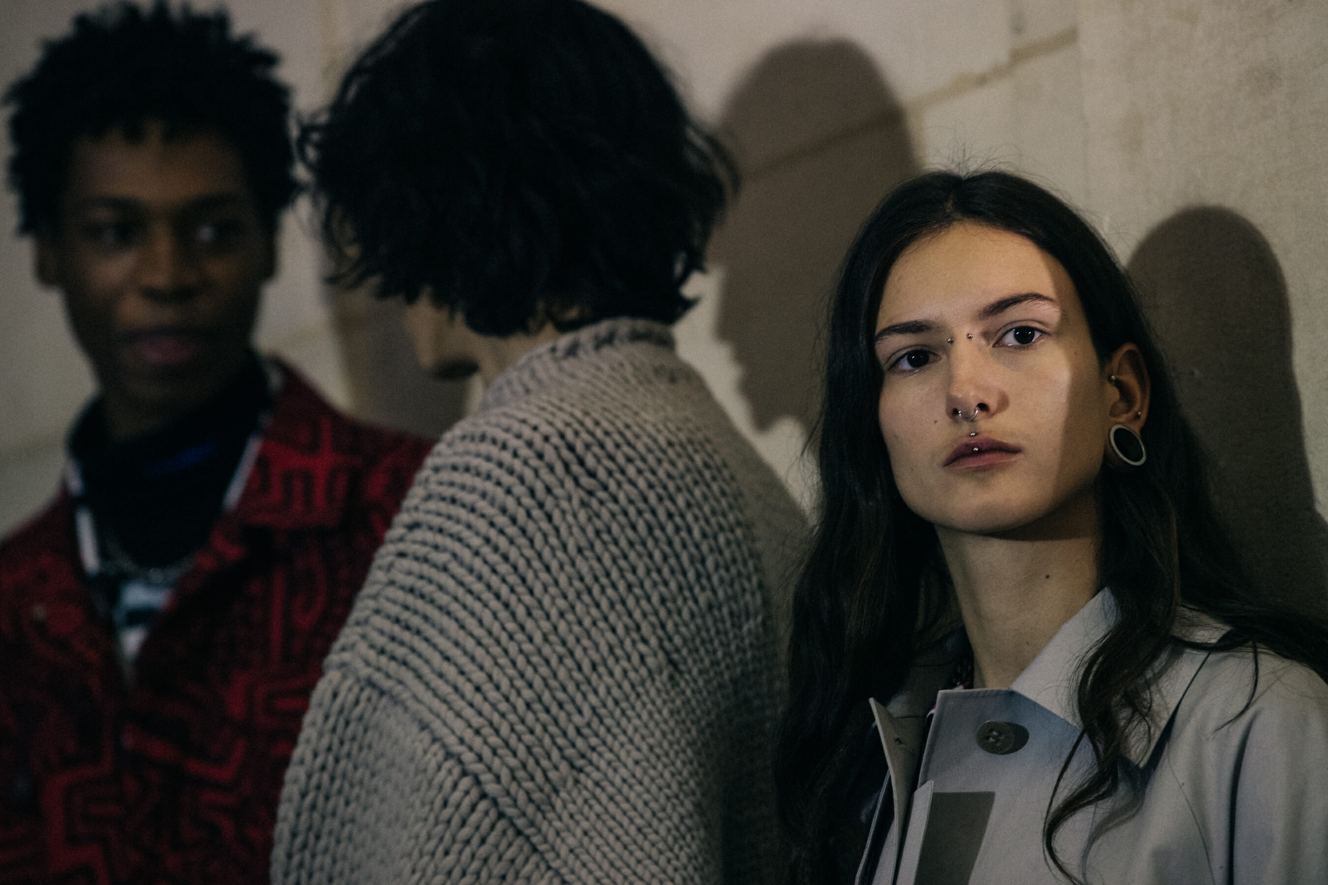 Model wearing grey at Etudes