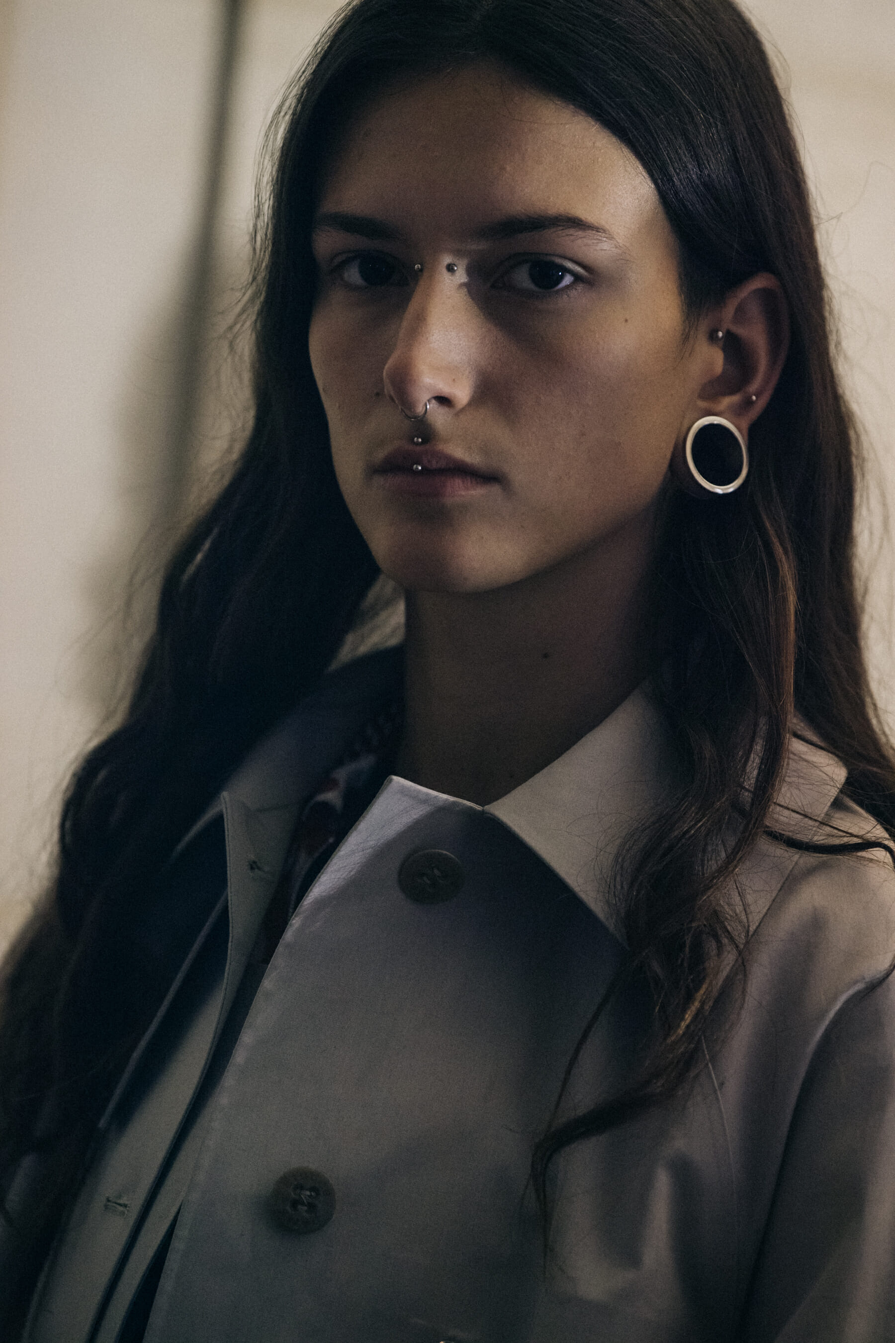 Model wearing grey at Etudes
