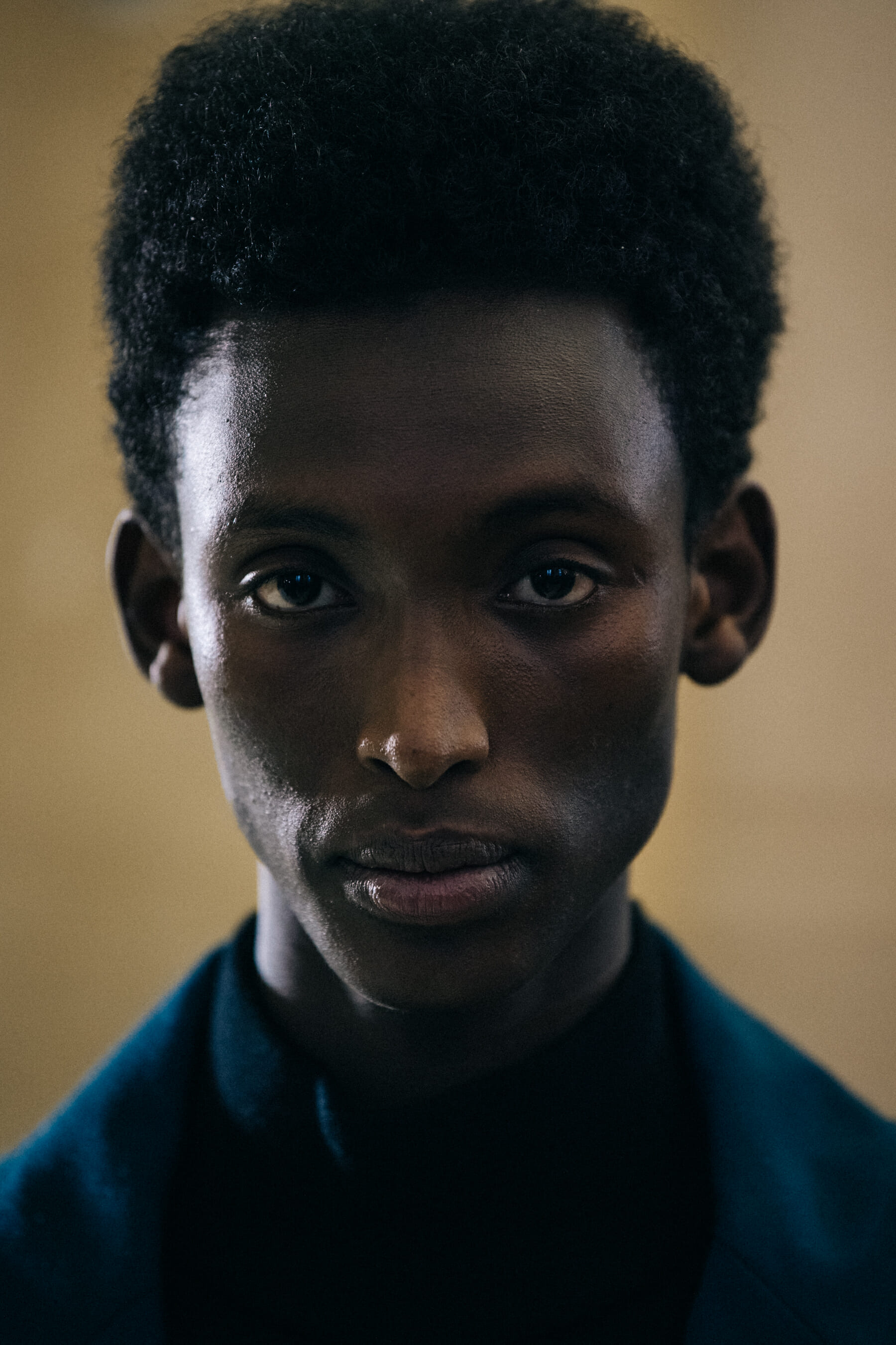 Portrait of model with thick black hair