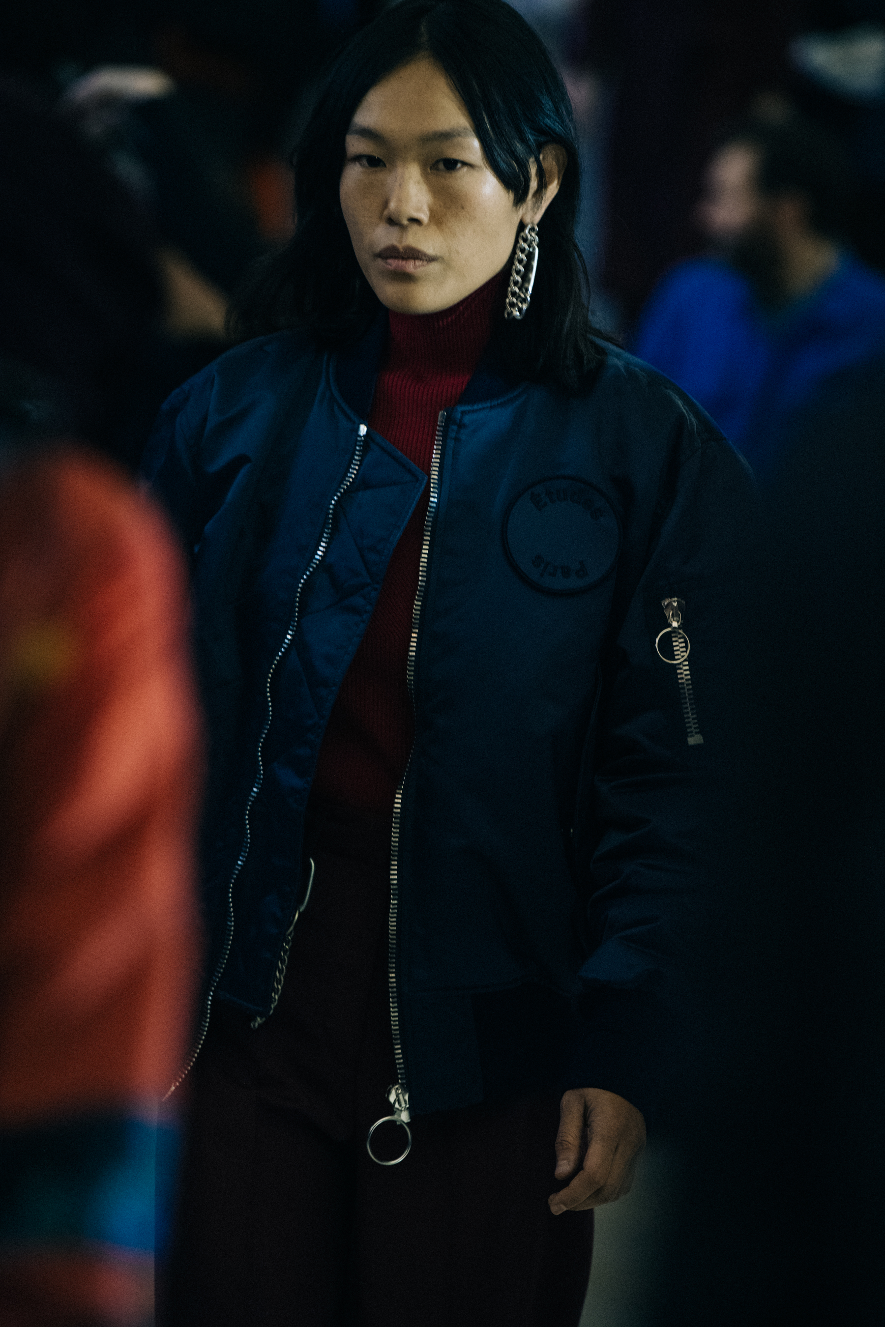 Model wearing dark blue backstage