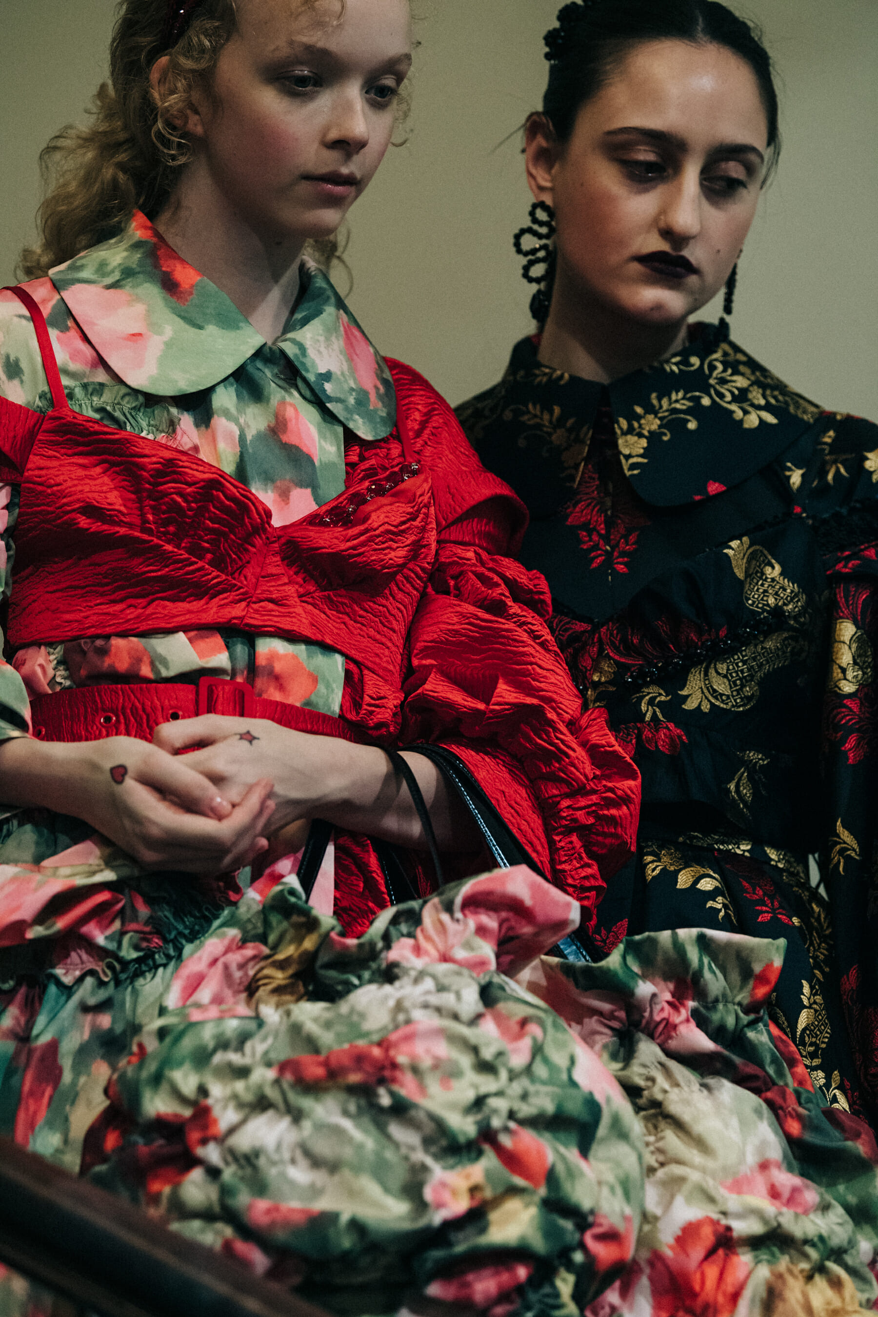 Two models wearing dresses at Simone Rocha