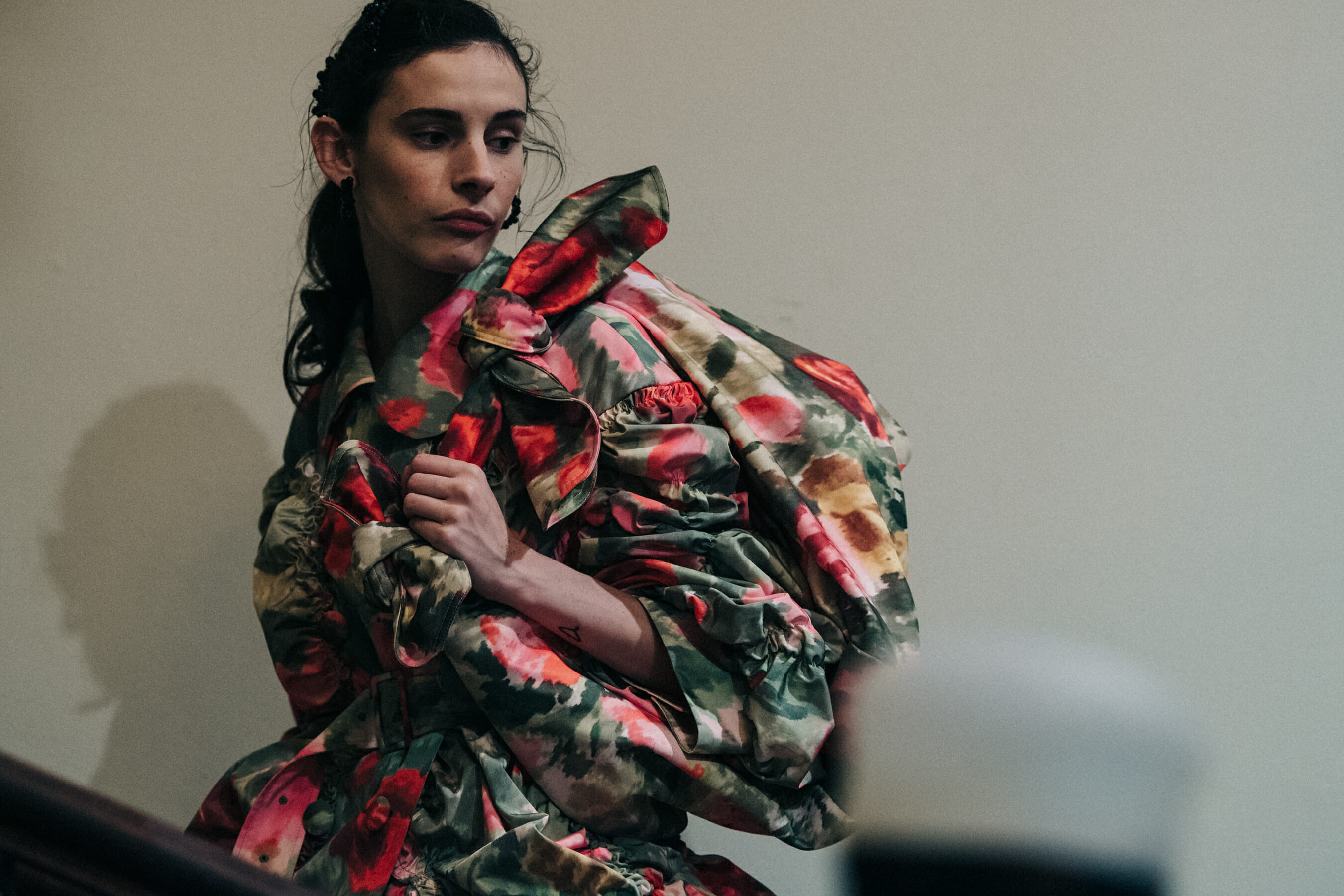 Model wearing floral dress at Simone Rocha
