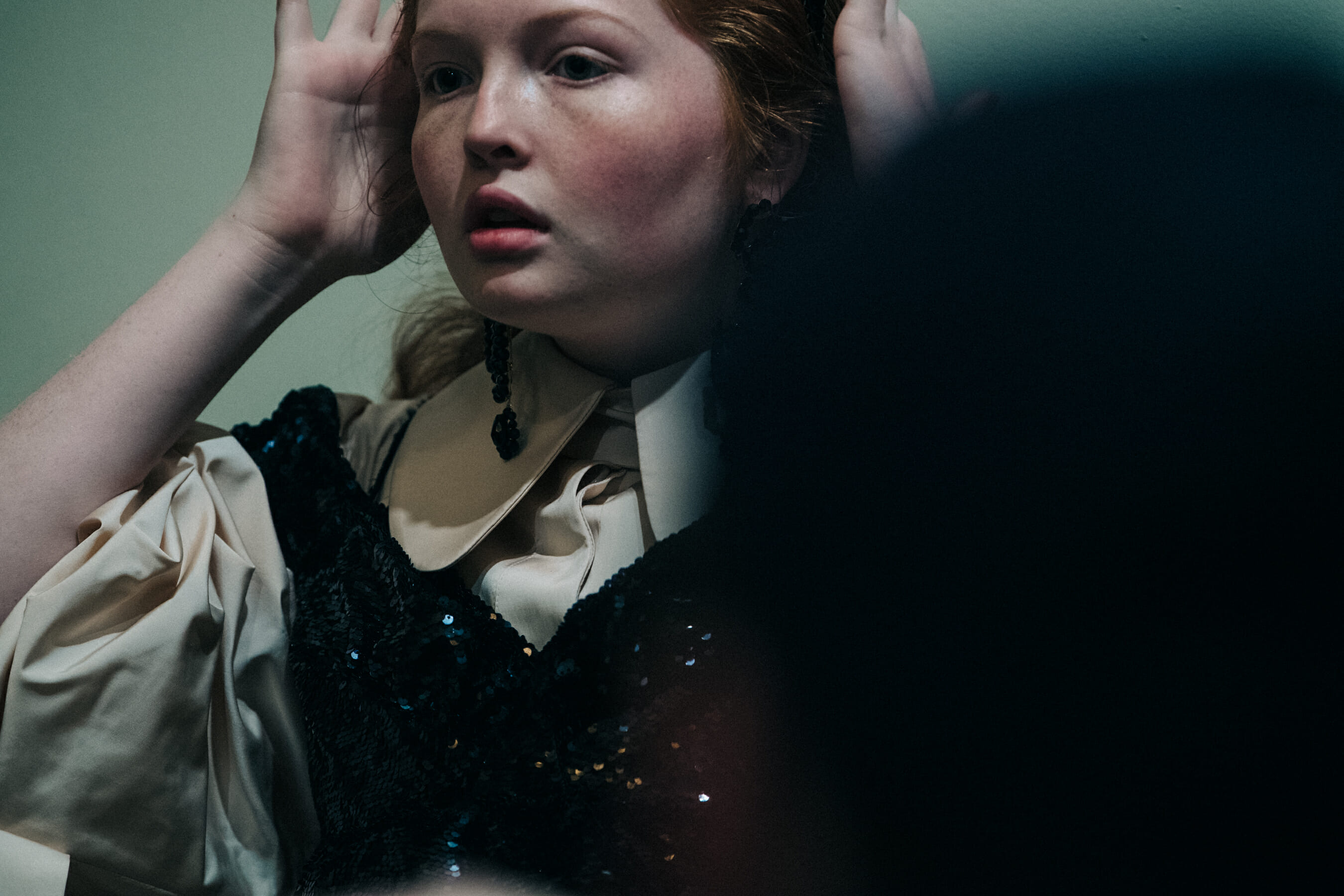 Model wearing tan dress at Simone Rocha