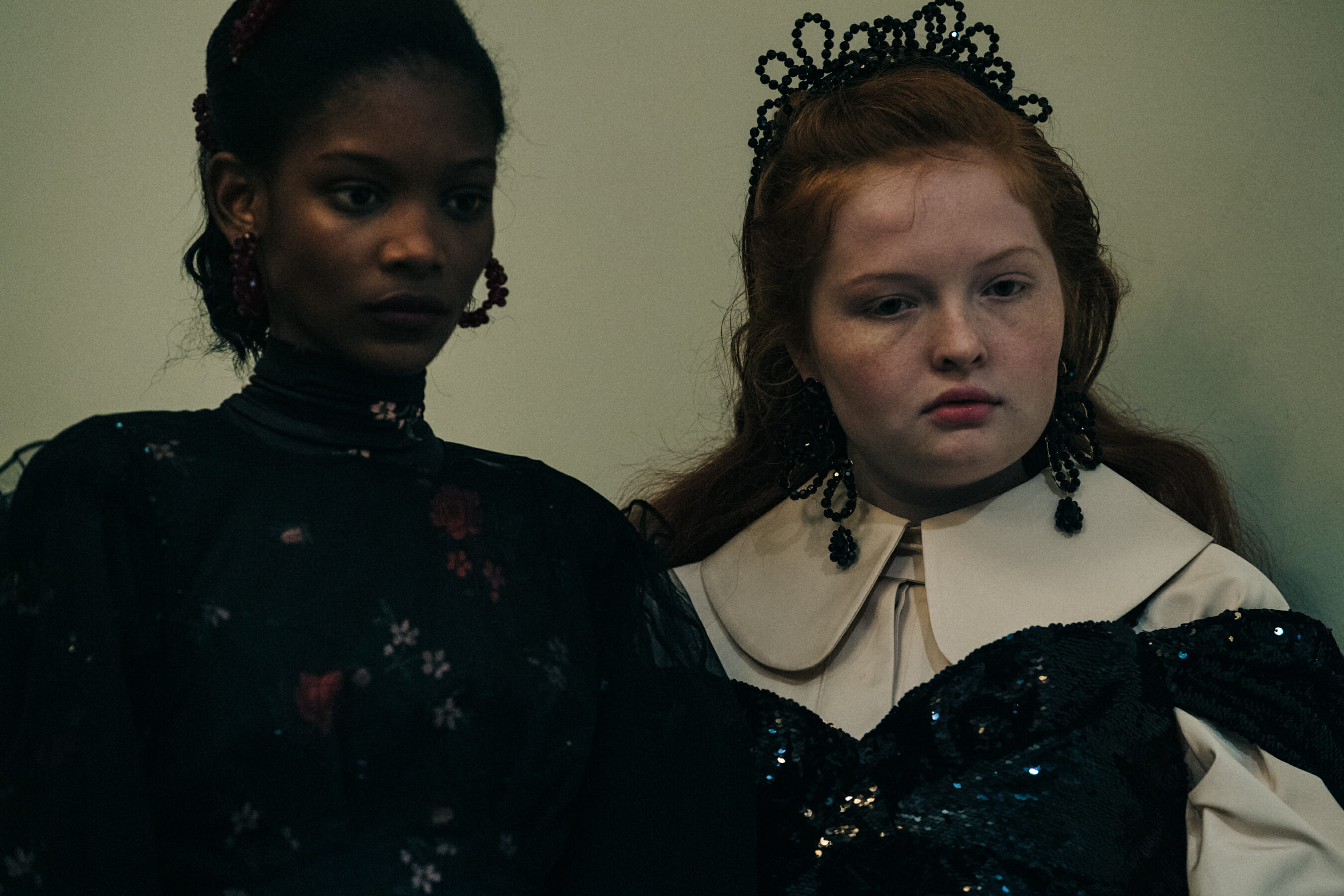 Models wearing colourful dresses at Simone Rocha