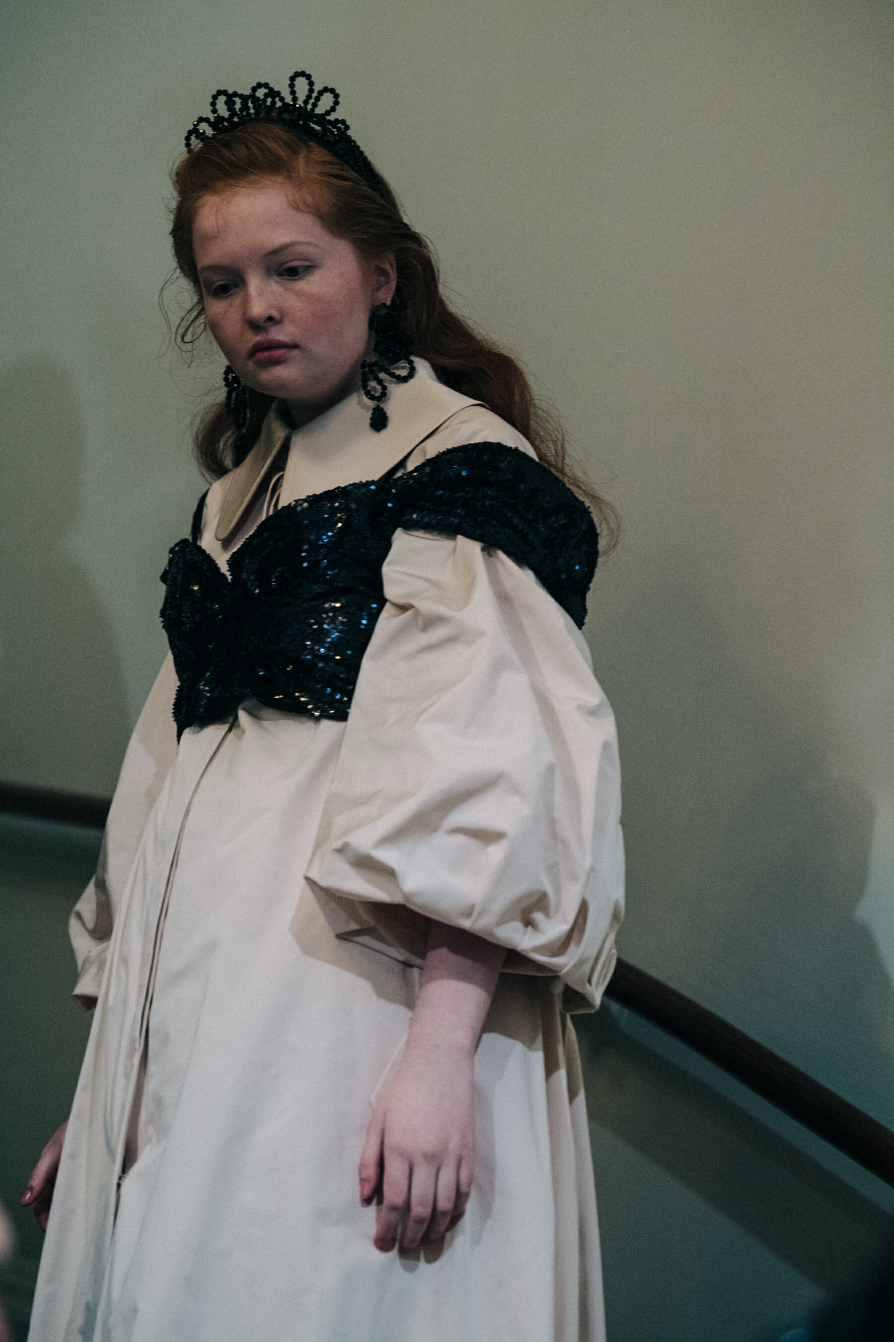 Models wearing colourful dresses at Simone Rocha