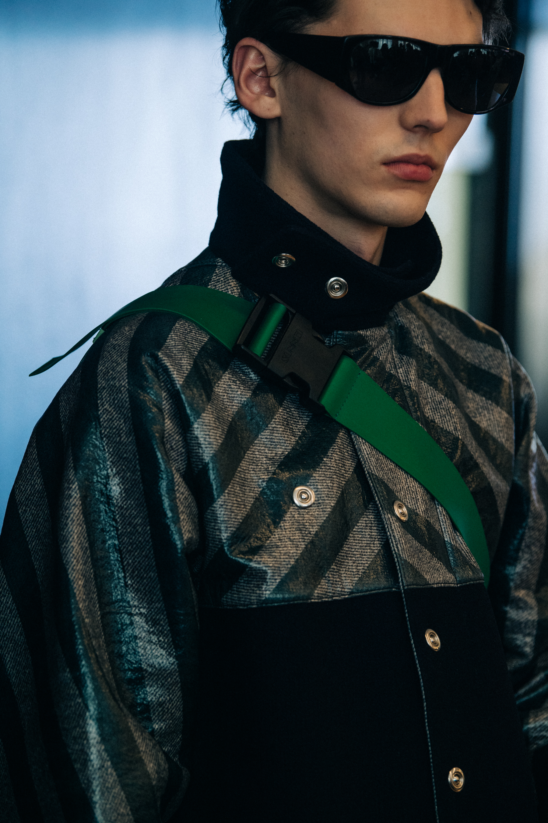 Model wearing stripes backstage