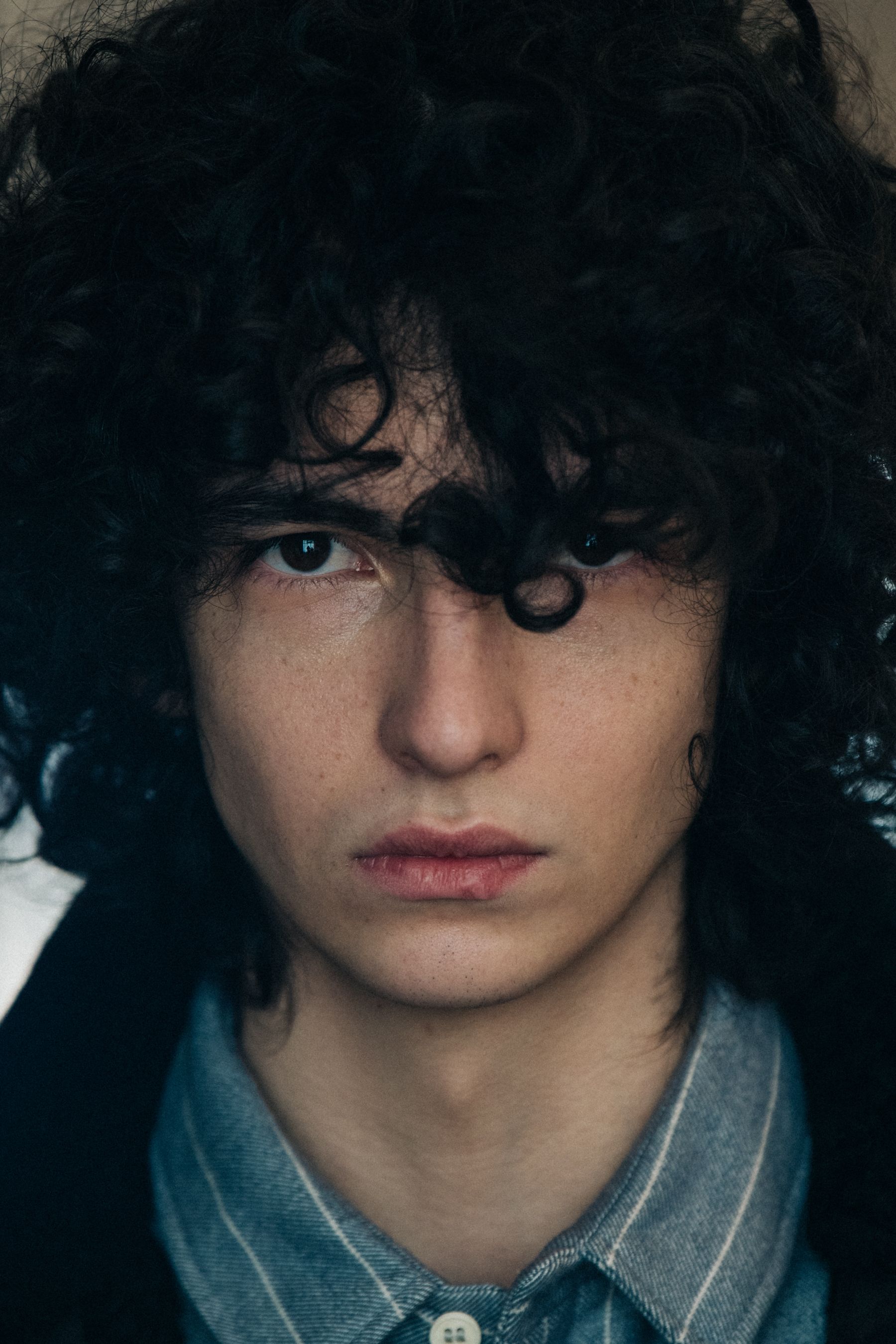 Portrait of model with curly hair