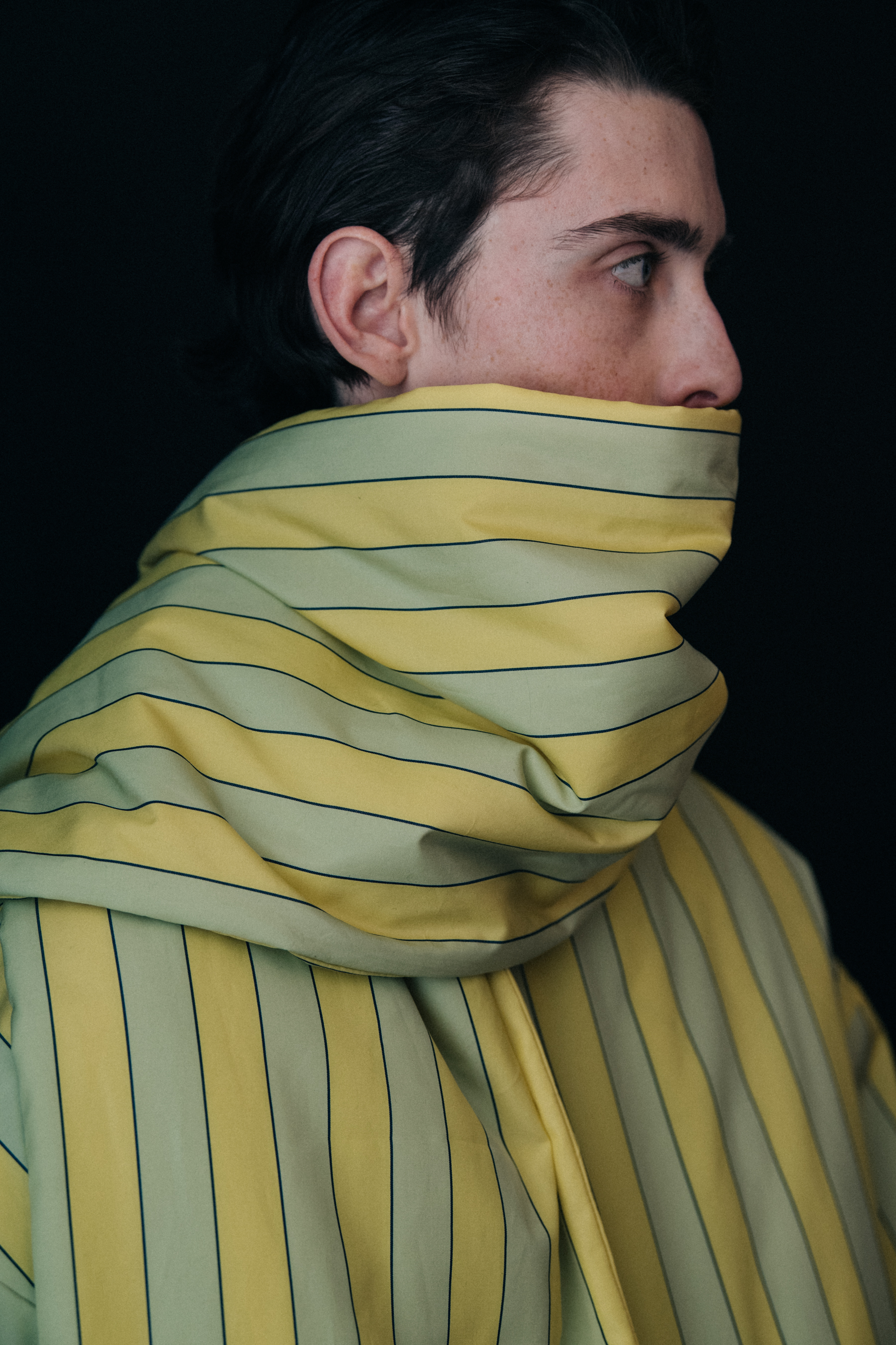 Model wearing stripes backstage