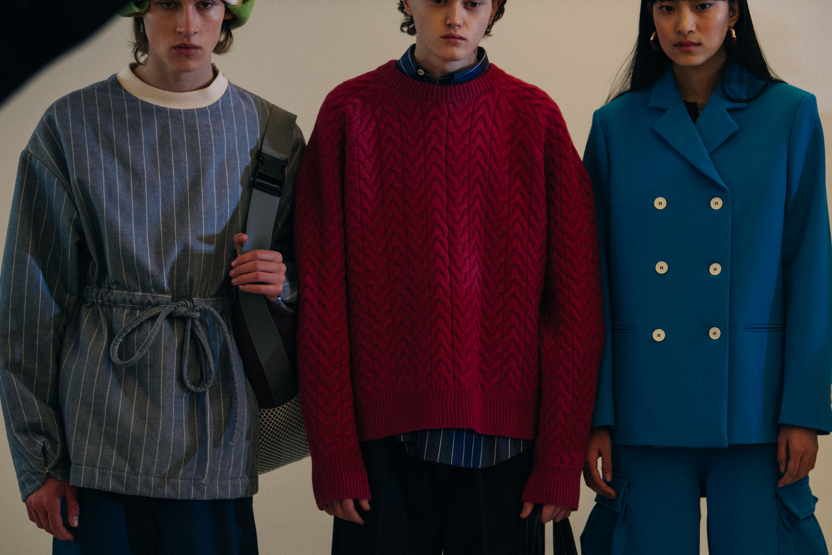 Models wearing colourful Sunnei outfits