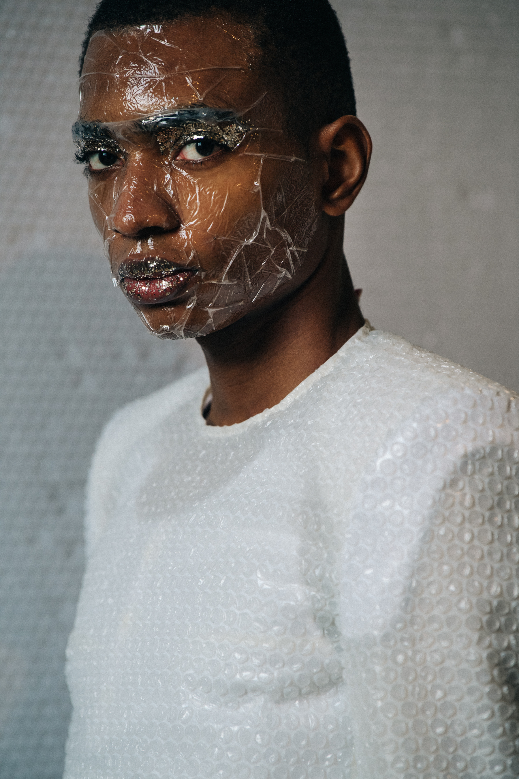 Model wearing bubble wrap outfit