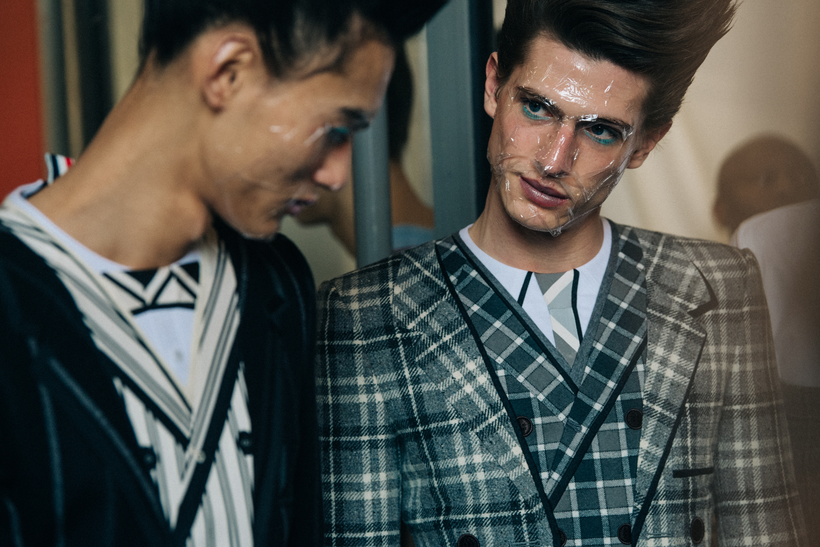 Model wearing Thom Browne suit