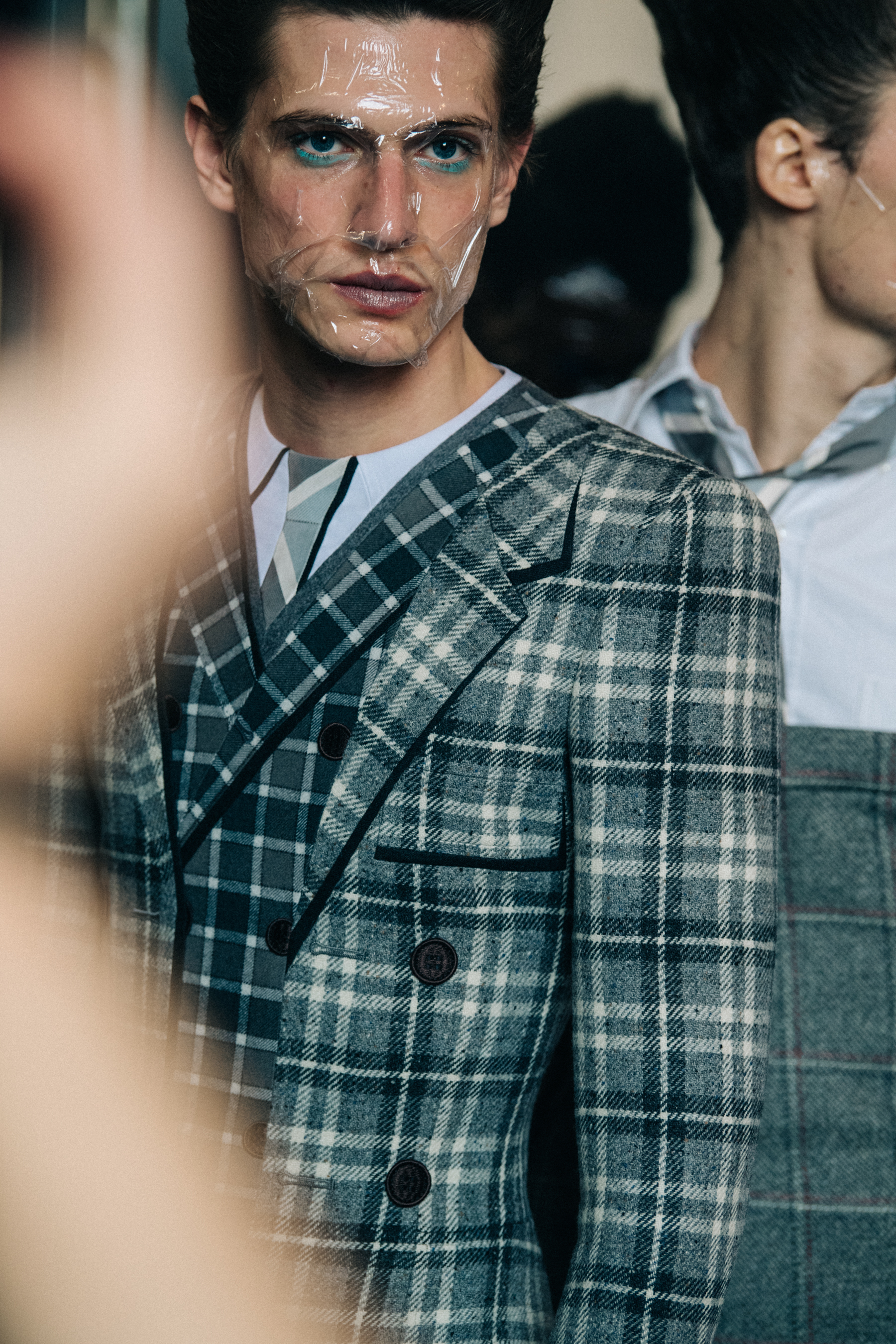 Model wearing Thom Browne suit