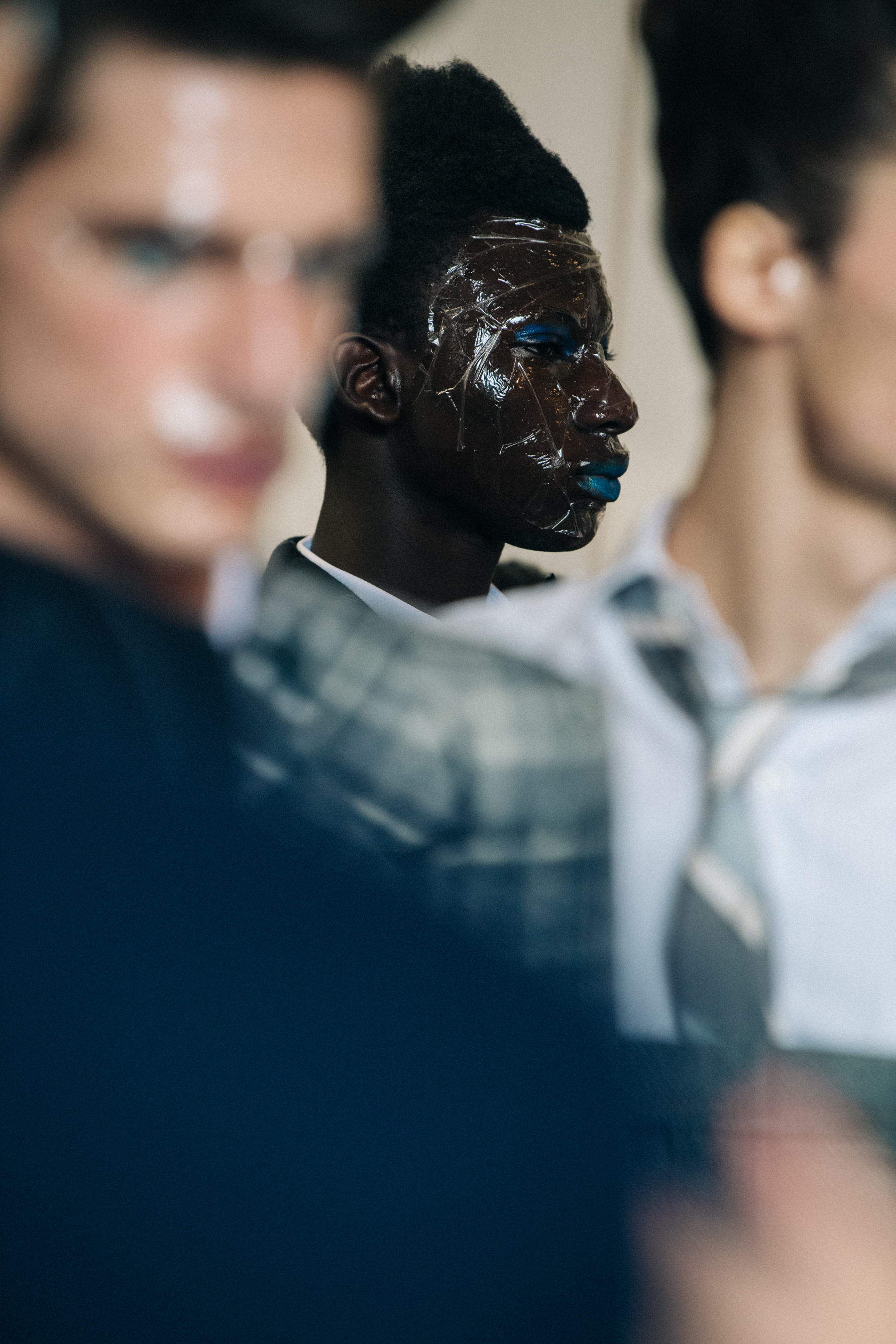 Model wearing Thom Browne suit