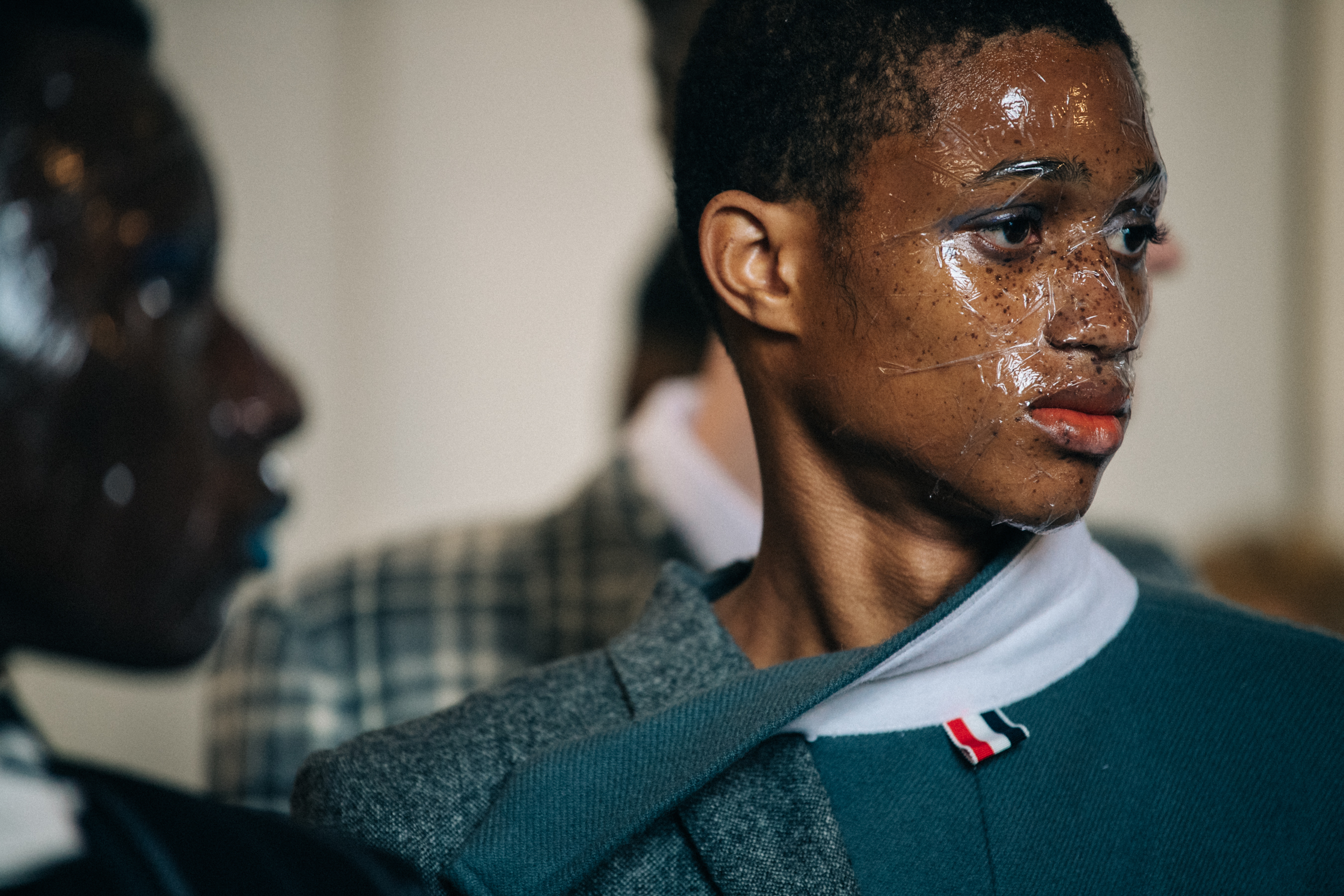 Model wearing Thom Browne suit