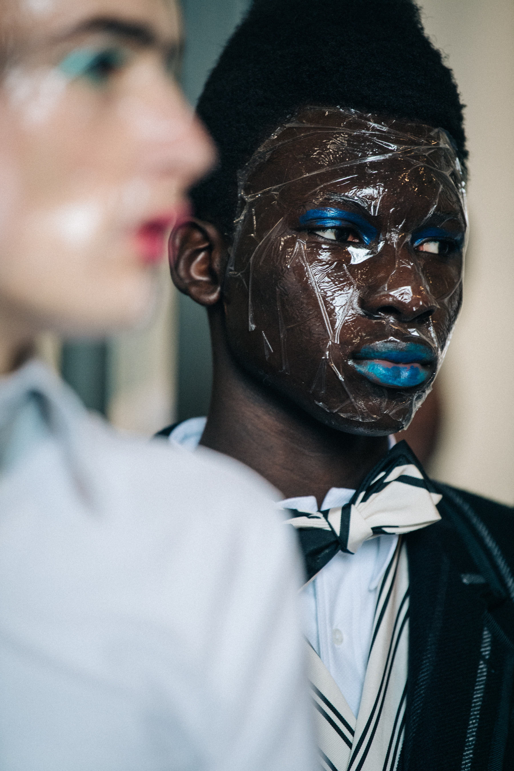 Model wearing Thom Browne suit