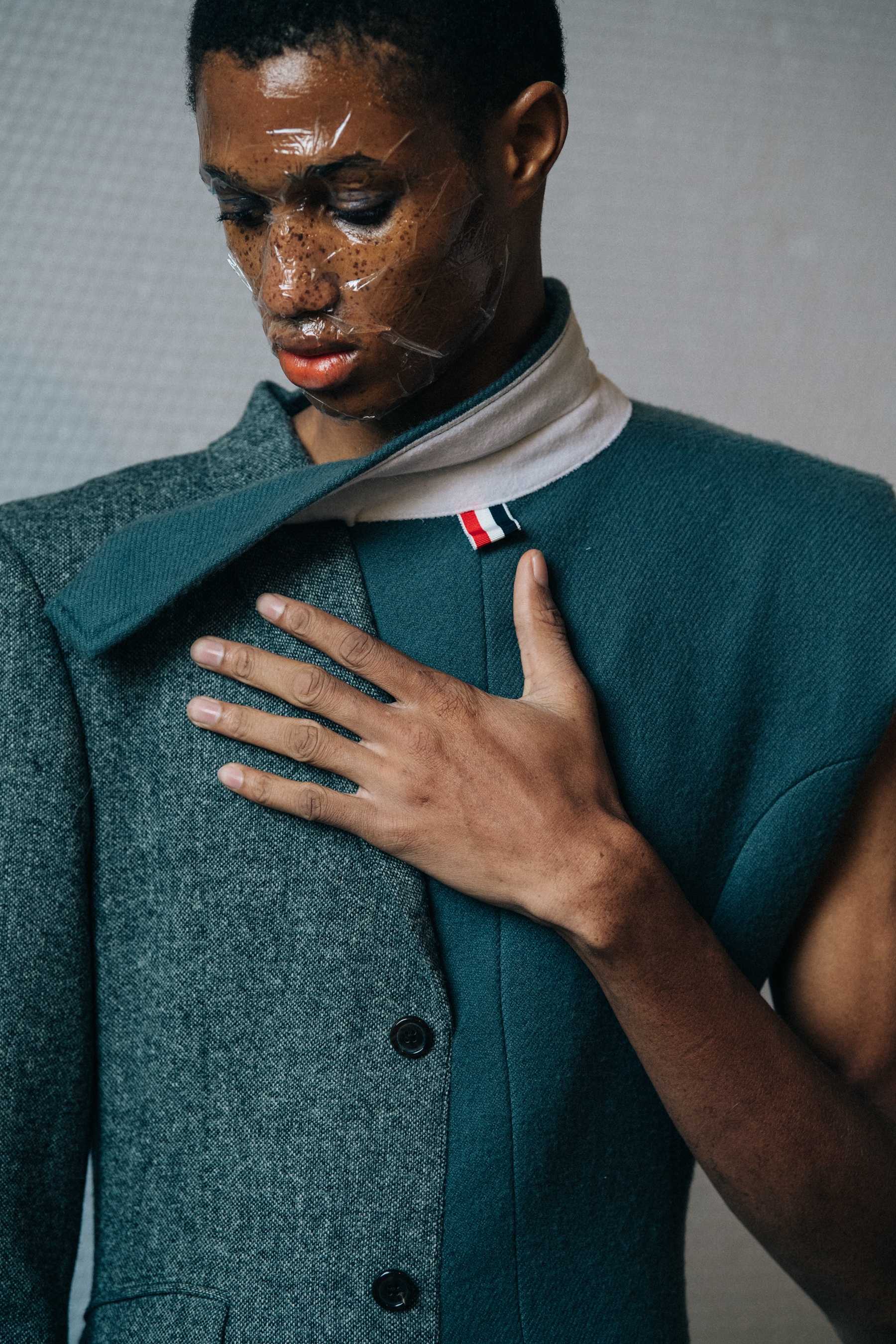 Model wearing Thom Browne suit