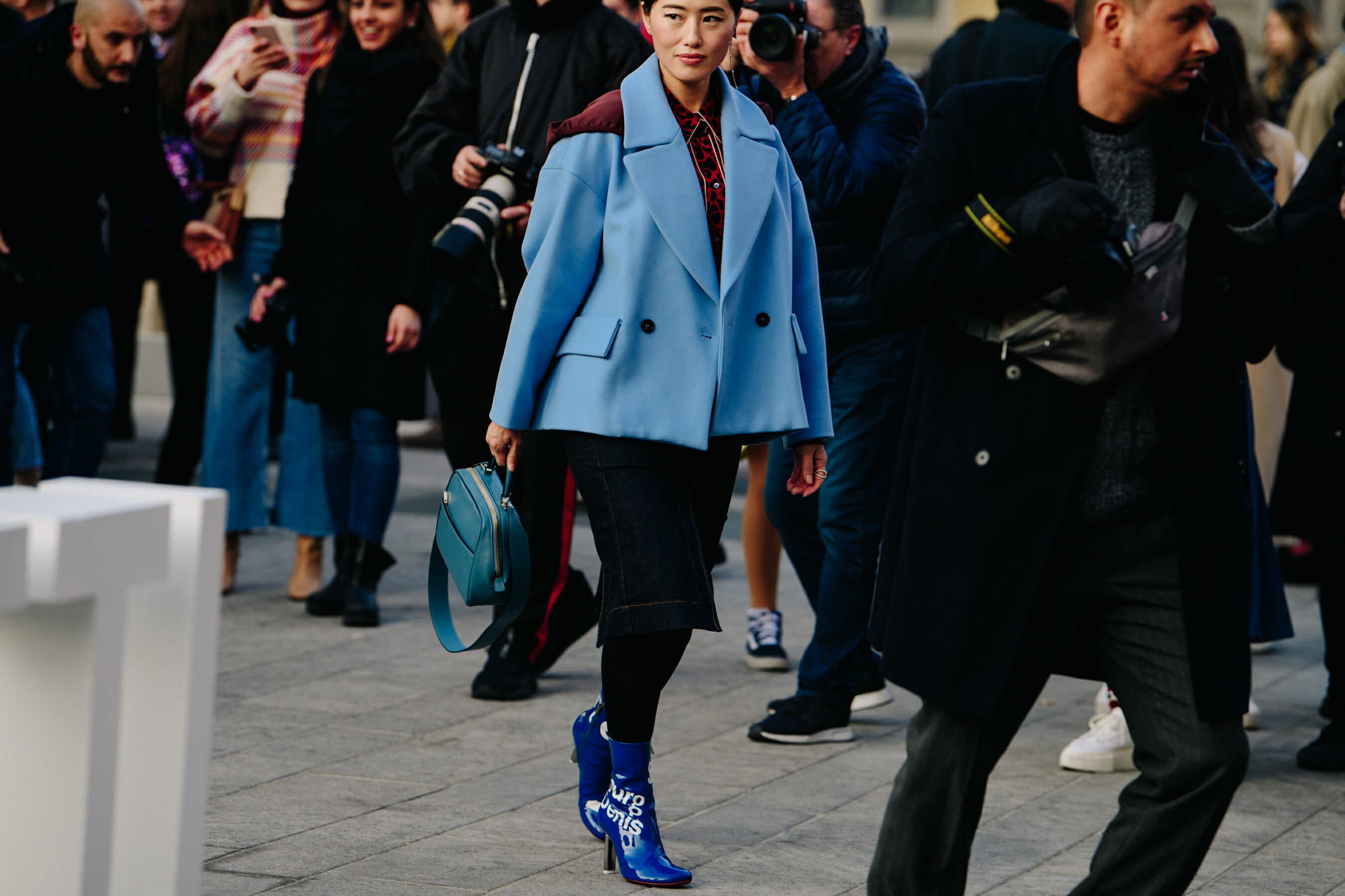 Woman wearing blue jacket