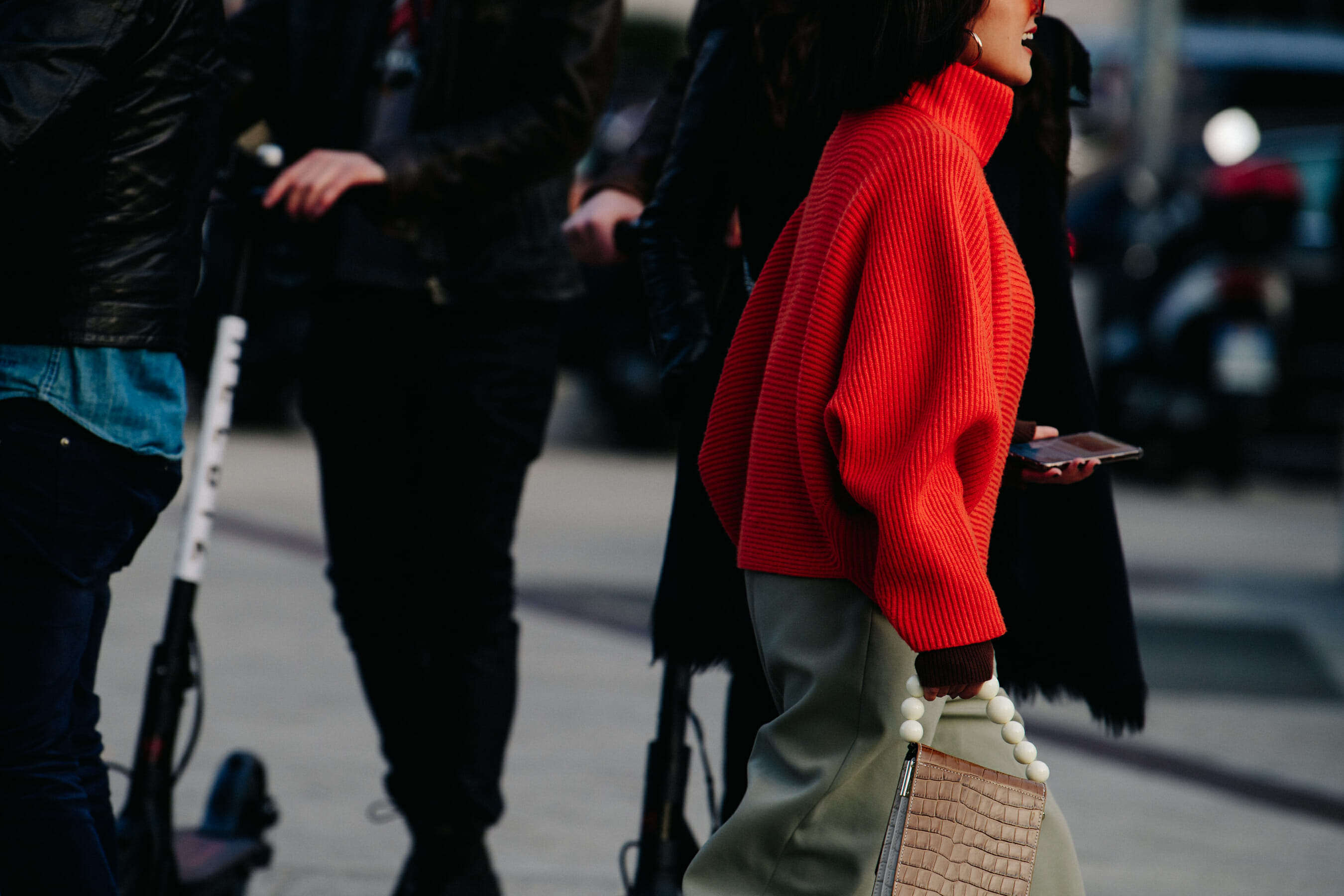 Woman wearing red jumper