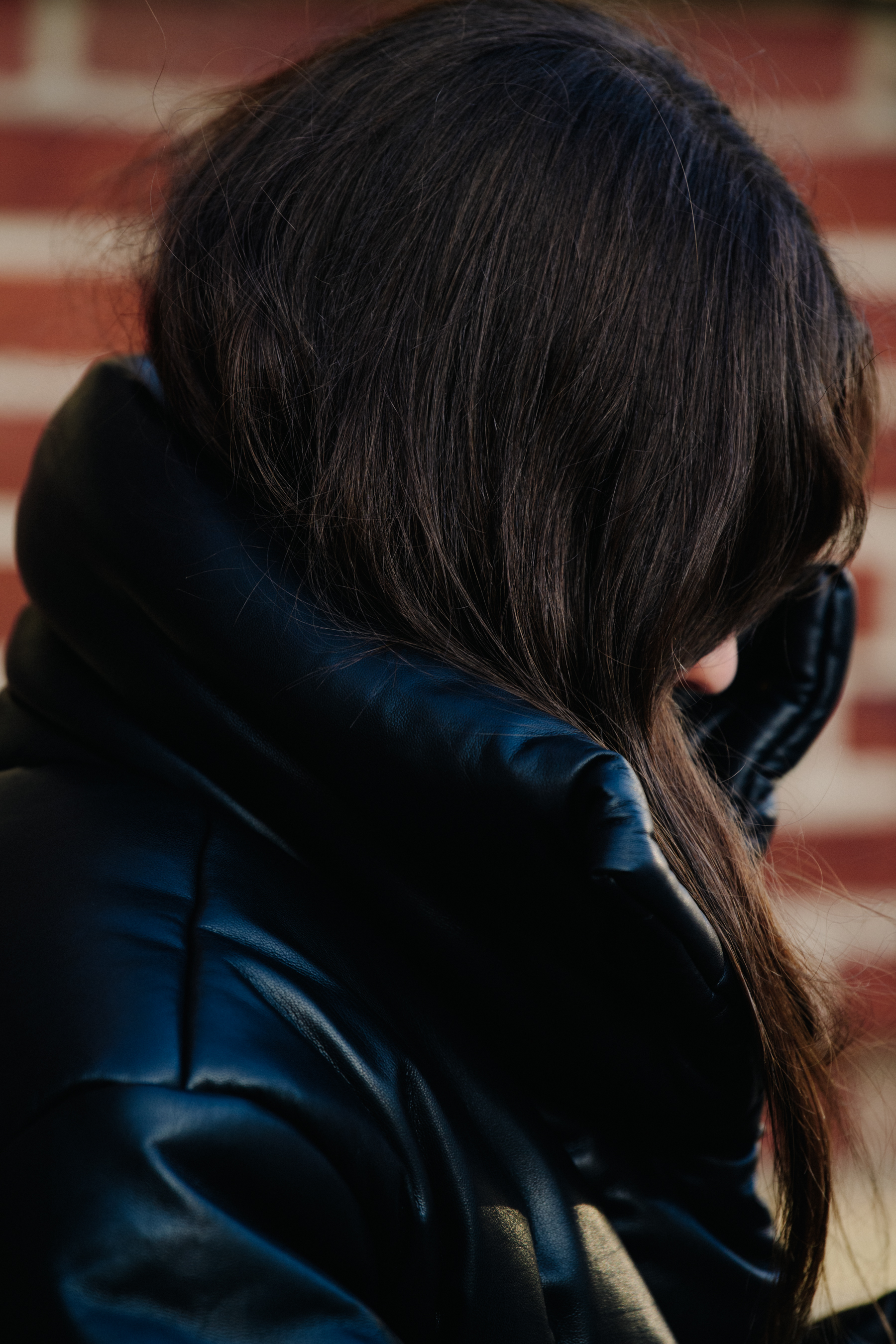 Woman wearing black coat