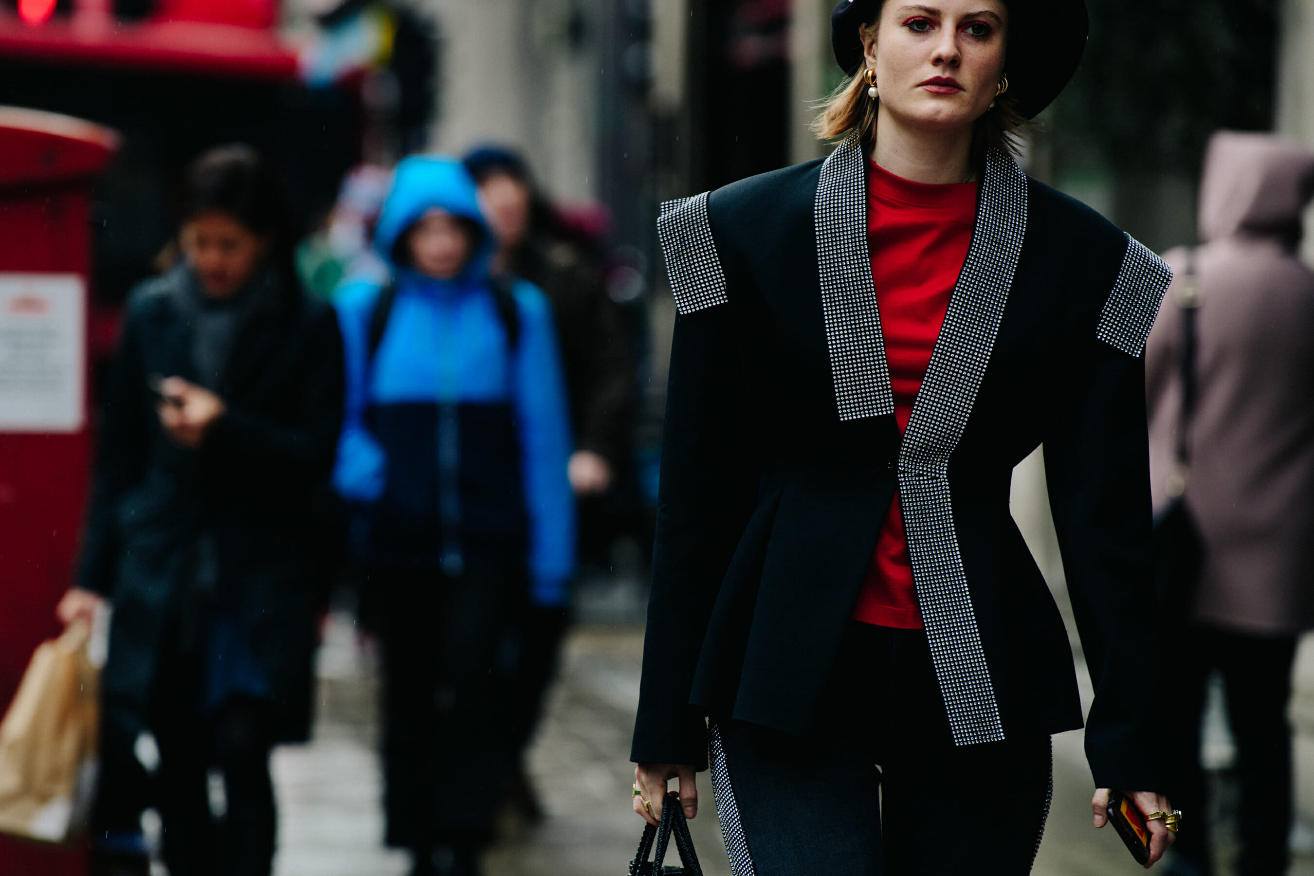 Woman wearing silver jewel jacket